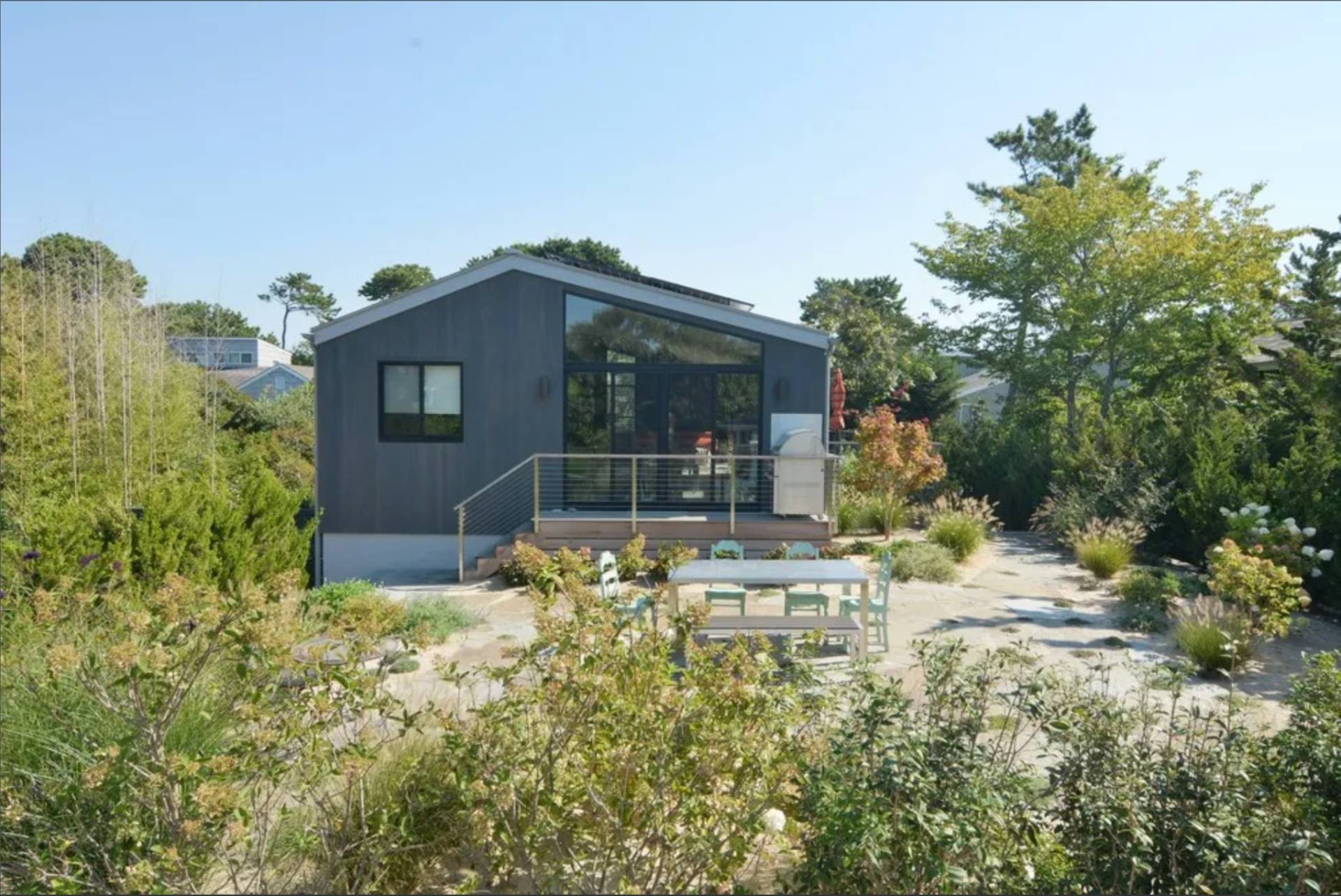 59 Devon Road Amagansett, NY 11930 - Photo 9 of 9 a front view of a house with a yard