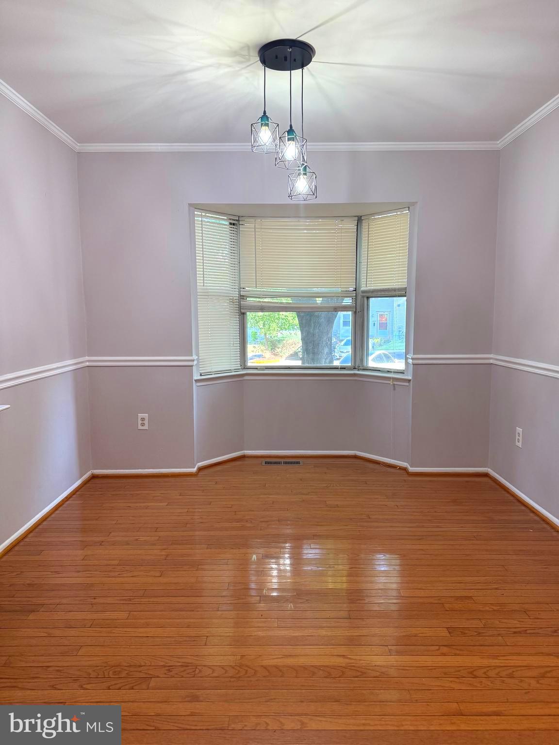 7028 Palamar Turn Lanham, MD 20706 - Photo 11 of 44 wooden floor in an empty room with a window