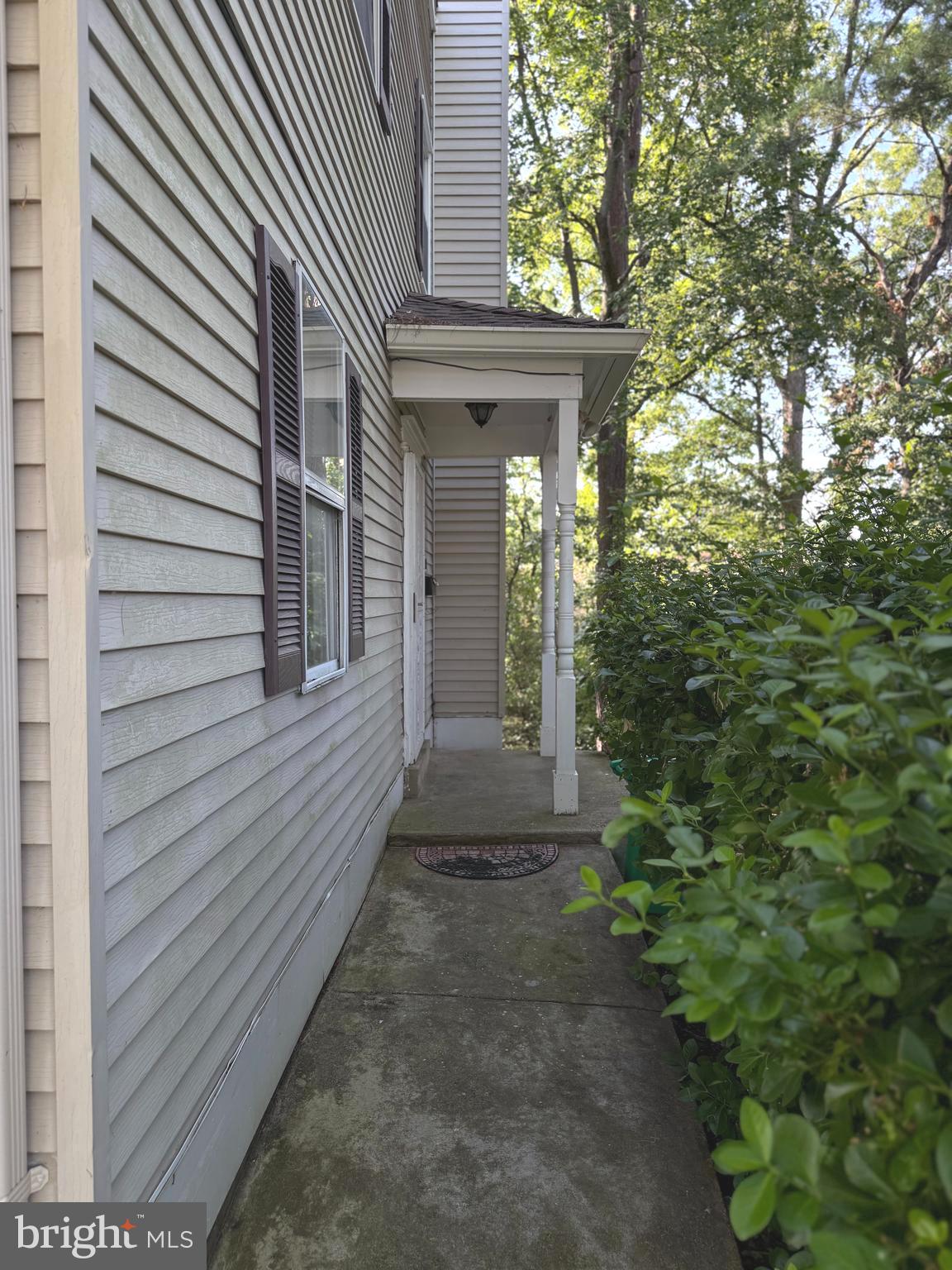 7028 Palamar Turn Lanham, MD 20706 - Photo 2 of 44 a view of a pathway with a house