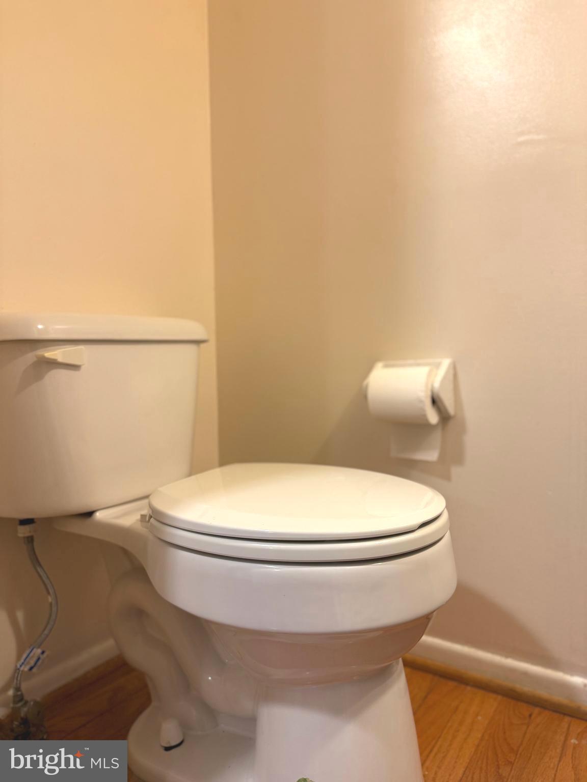 7028 Palamar Turn Lanham, MD 20706 - Photo 21 of 44 a white toilet sitting next to a shower
