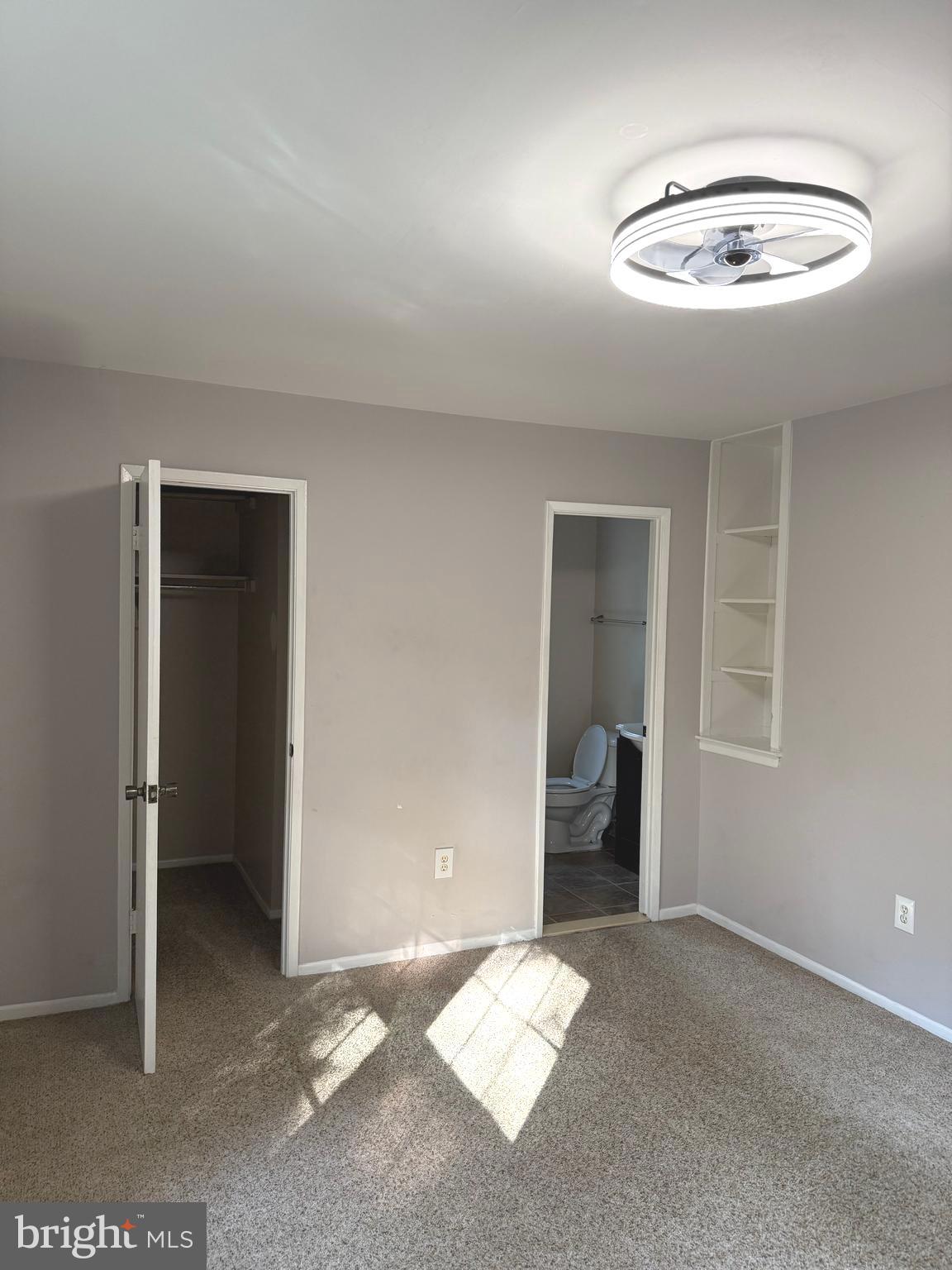 7028 Palamar Turn Lanham, MD 20706 - Photo 23 of 44 a view of a livingroom with wooden floor and a chandelier