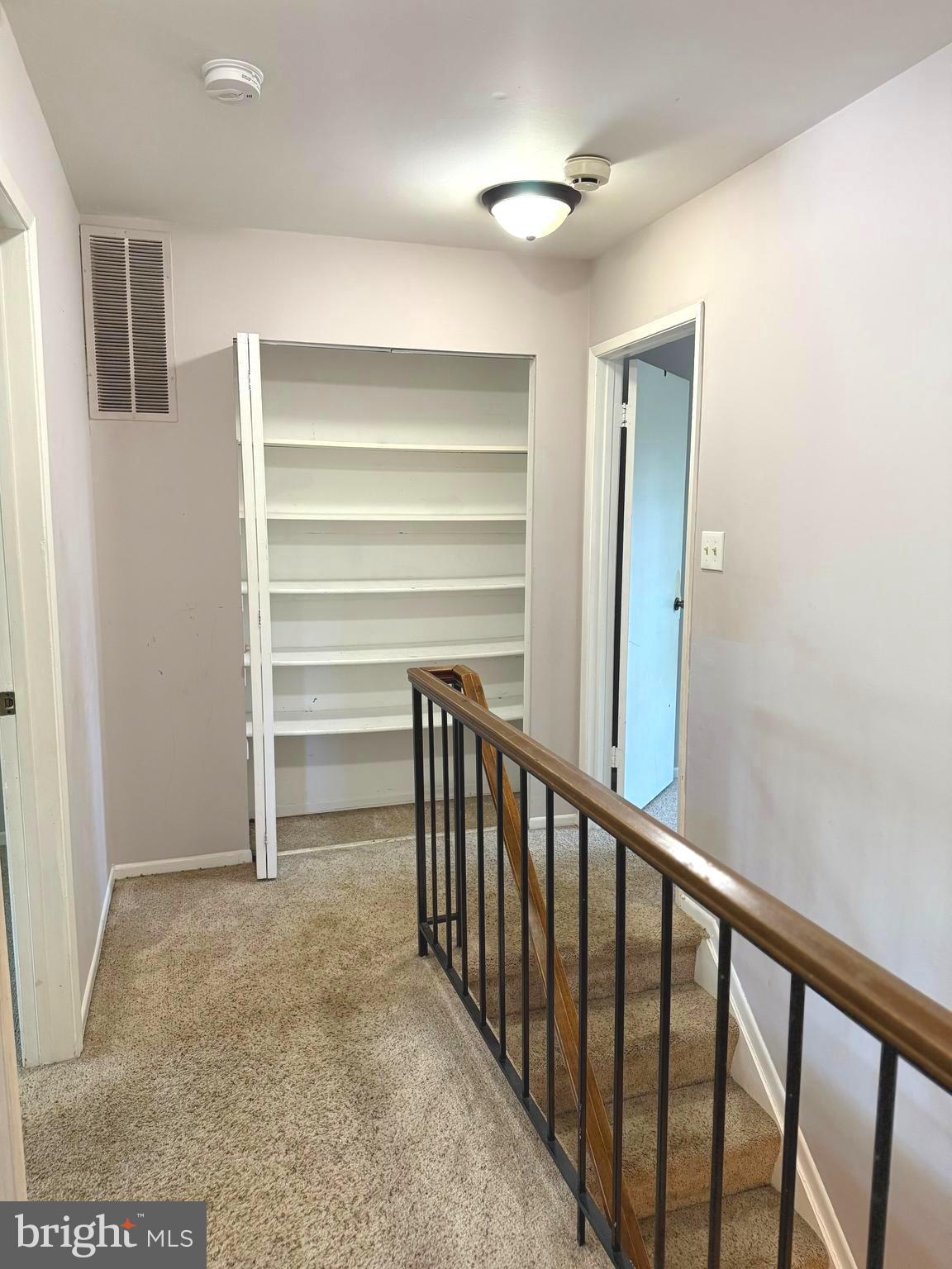 7028 Palamar Turn Lanham, MD 20706 - Photo 31 of 44 a view of a hallway with closet