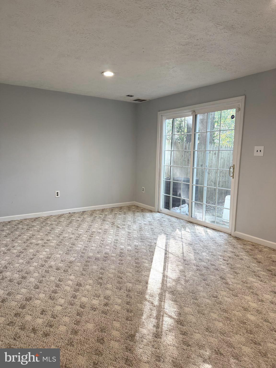 7028 Palamar Turn Lanham, MD 20706 - Photo 33 of 44 a view of an empty room with a window