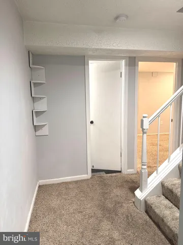 a view of livingroom with furniture and window