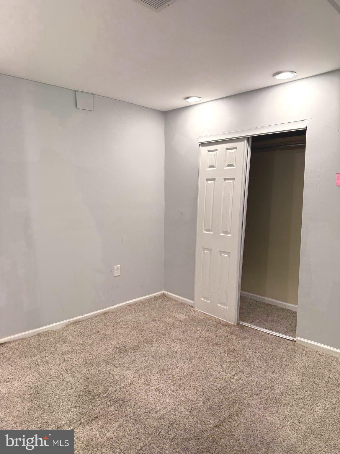 7028 Palamar Turn Lanham, MD 20706 - Photo 39 of 44 an empty room with closet area