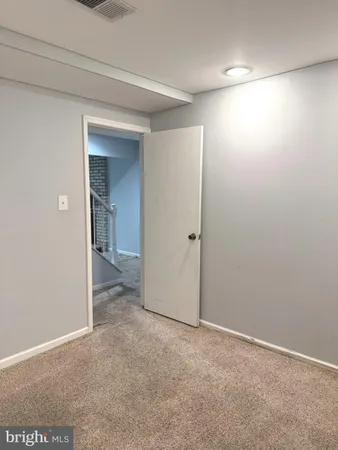 an empty room with closet