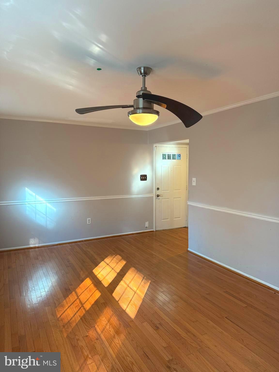 7028 Palamar Turn Lanham, MD 20706 - Photo 6 of 44 a view of empty room with wooden floor