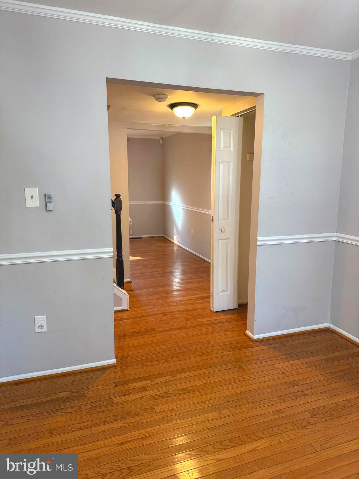 7028 Palamar Turn Lanham, MD 20706 - Photo 10 of 44 a view of empty room with wooden floor