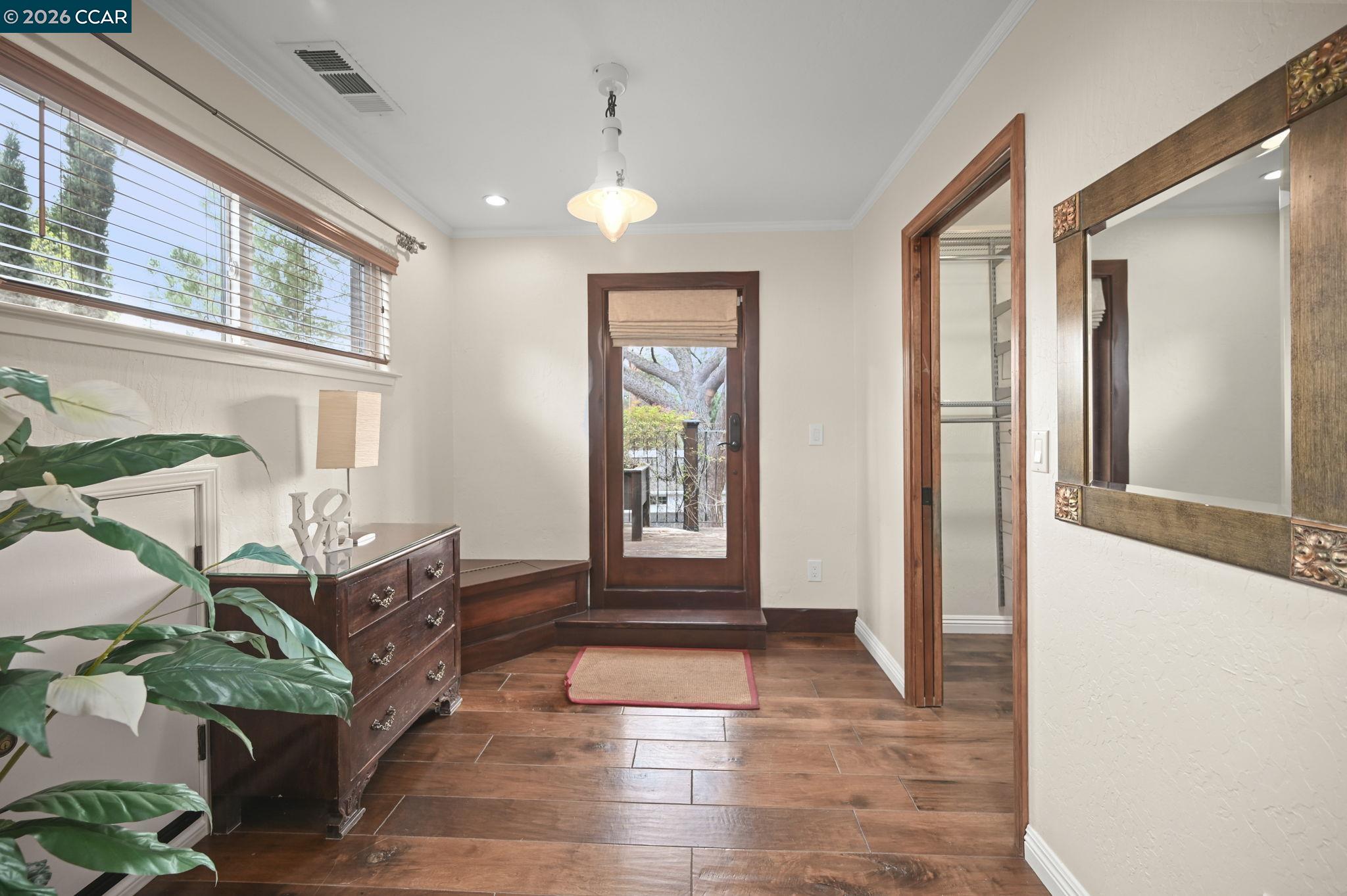 321 Livorna Heights Road Alamo, CA 94507 - Photo 16 of 60 a living room with furniture and a floor to ceiling window