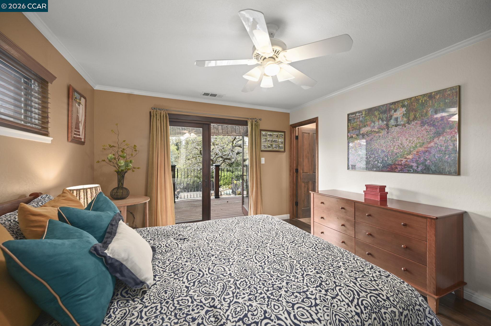 321 Livorna Heights Road Alamo, CA 94507 - Photo 22 of 60 a bedroom with a bed and a chandelier