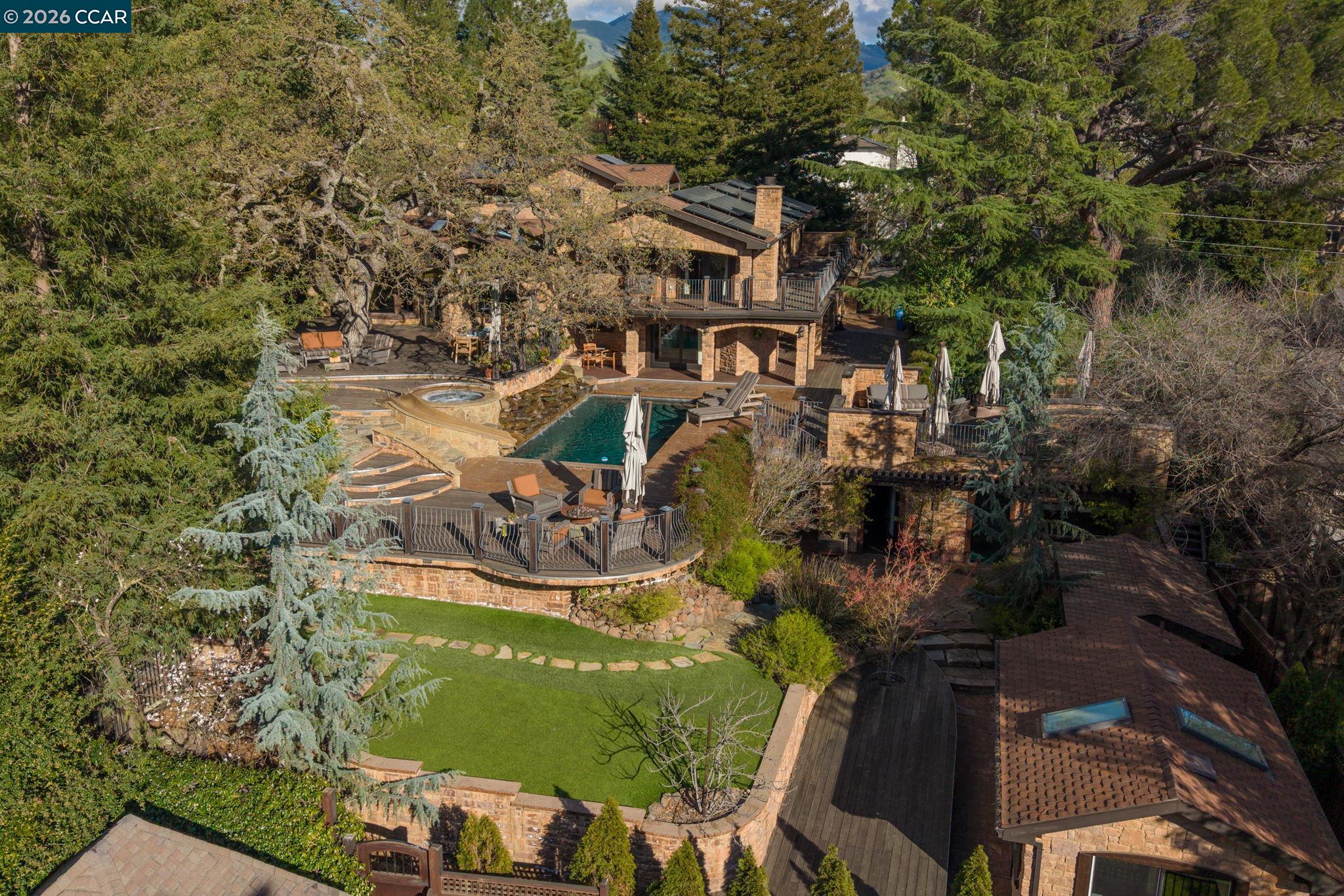 321 Livorna Heights Road Alamo, CA 94507 - Photo 41 of 60 an aerial view of a house with outdoor space swimming pool and lake view