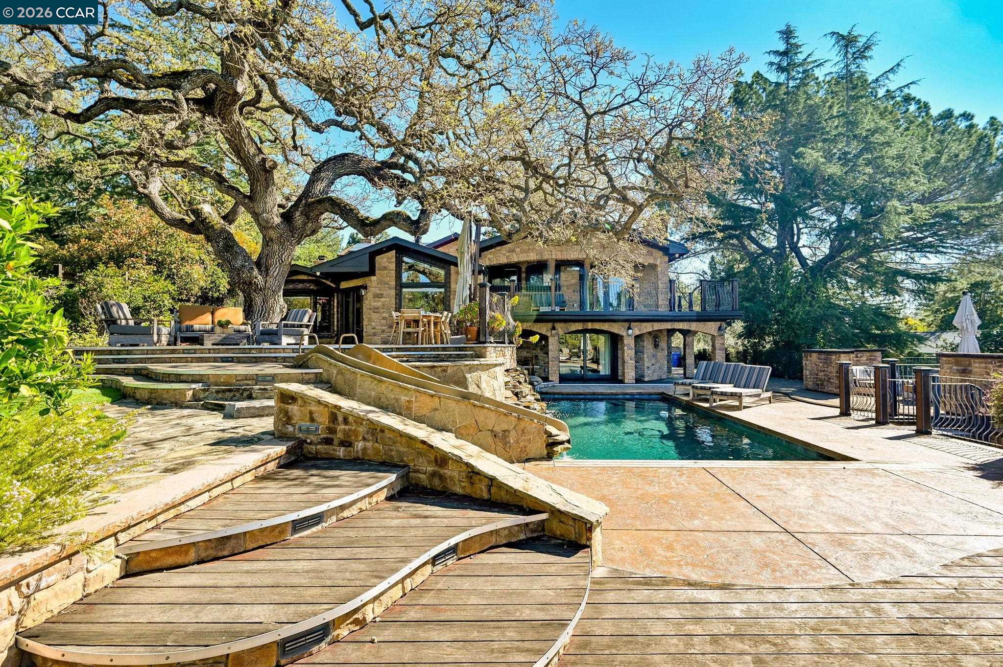 321 Livorna Heights Road Alamo, CA 94507 - Photo 43 of 60 a view of a swimming pool with a patio