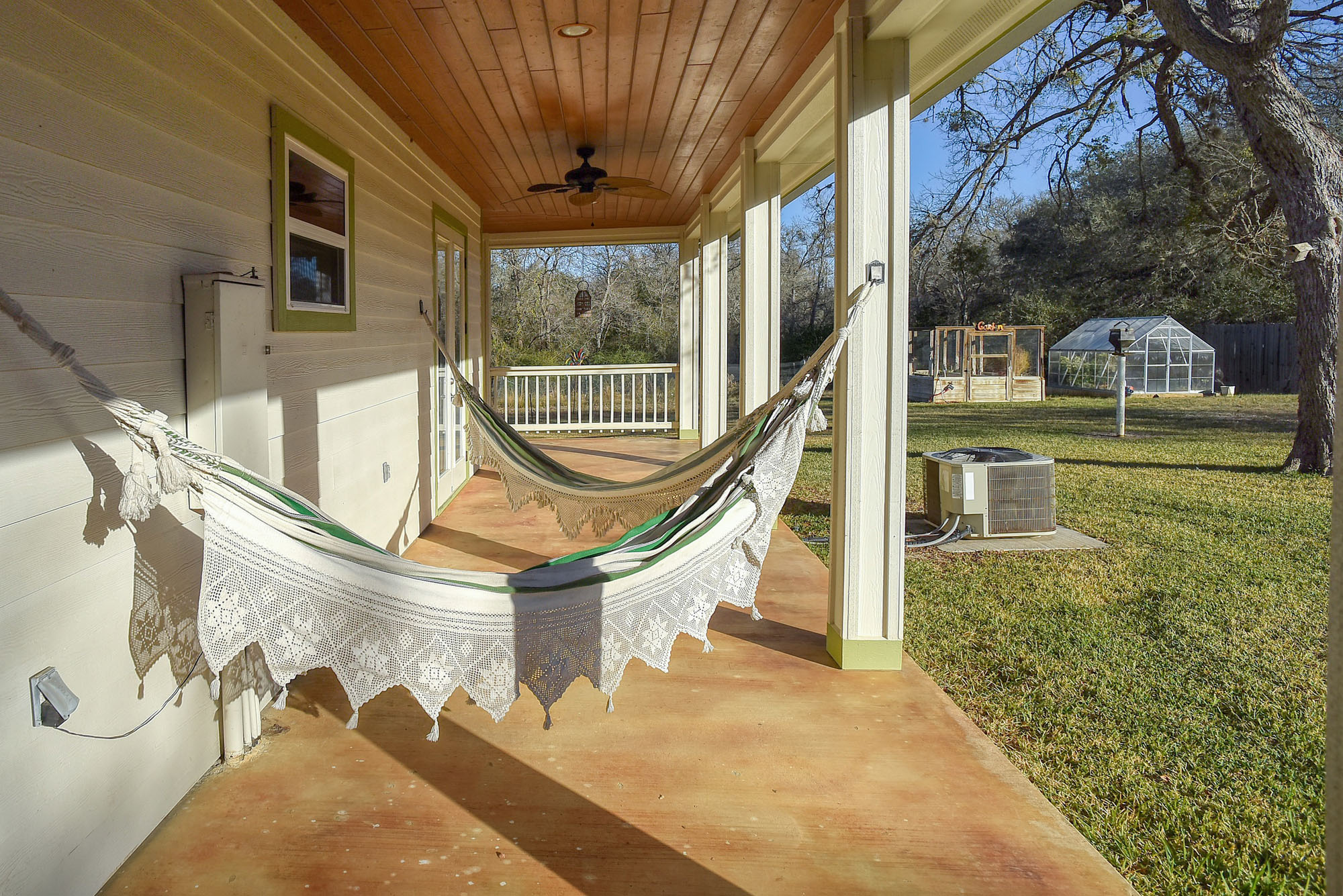 482 Watterson Road Bastrop, TX 78602 - Photo 31 of 40 Hammocks have custom hangers built into the siding so you can easily put them away.