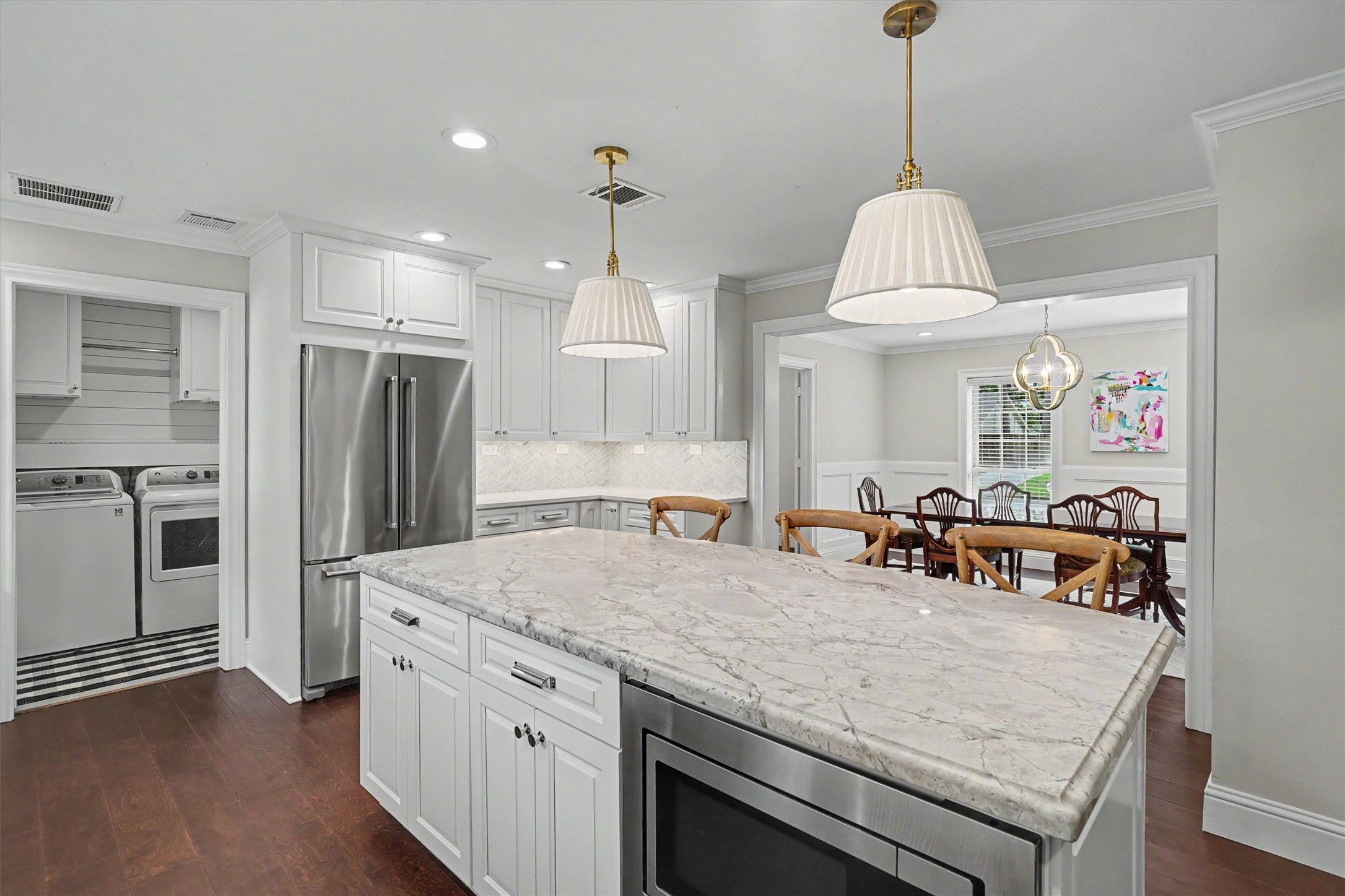751 Bison Drive Houston, TX 77079 - Photo 14 of 45 a kitchen with stainless steel appliances granite countertop a sink a refrigerator and a stove