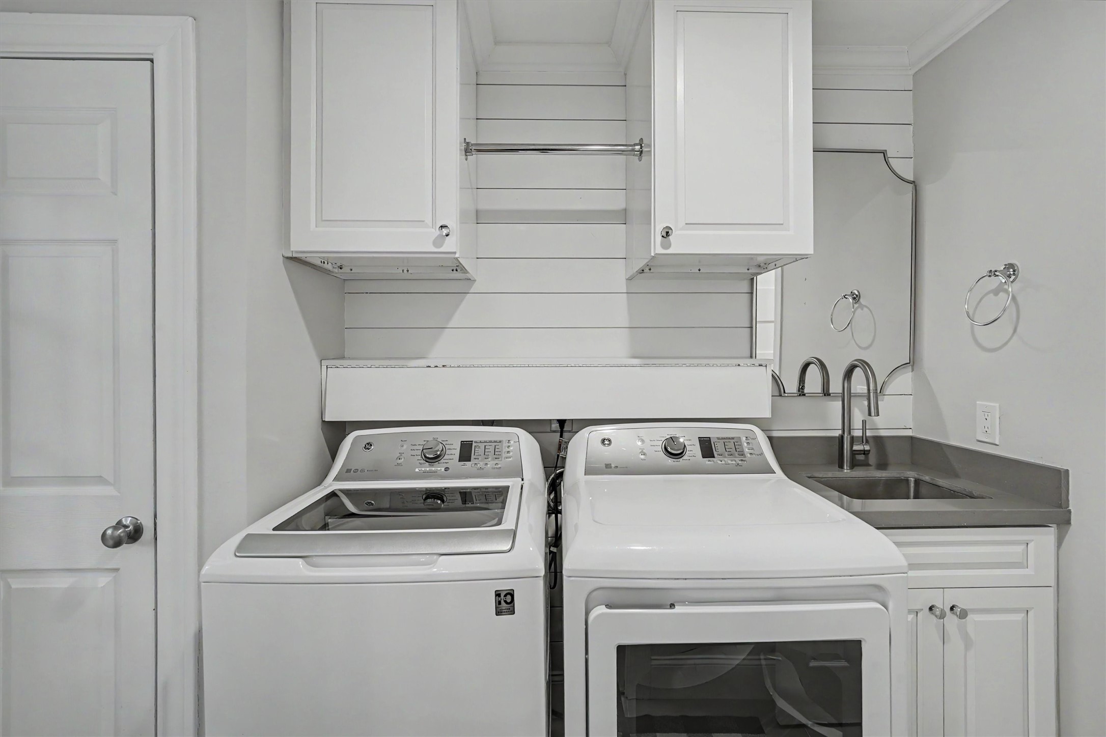 751 Bison Drive Houston, TX 77079 - Photo 16 of 45 a utility room with dryer and washer