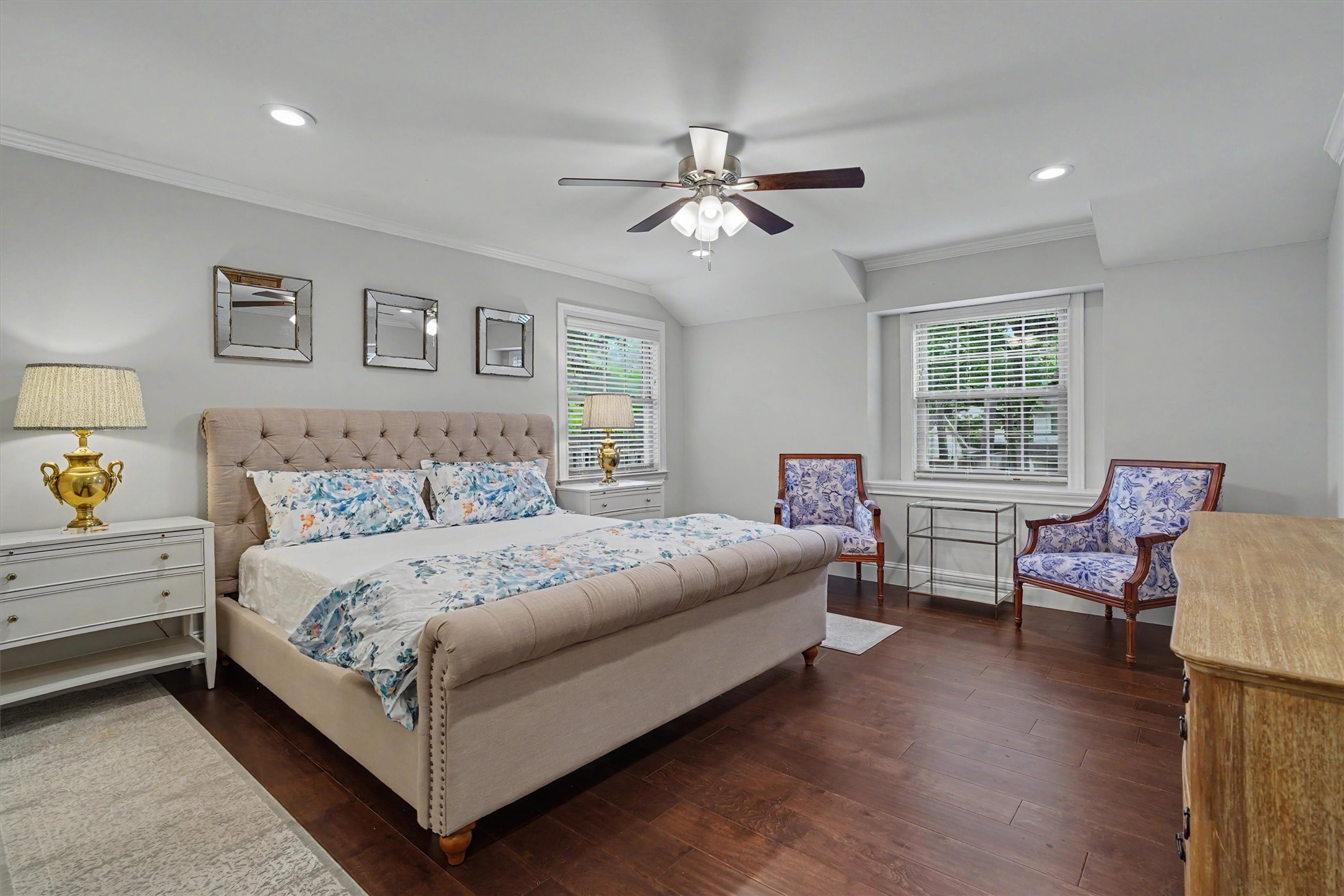 751 Bison Drive Houston, TX 77079 - Photo 18 of 45 a bedroom with a bed and a dresser