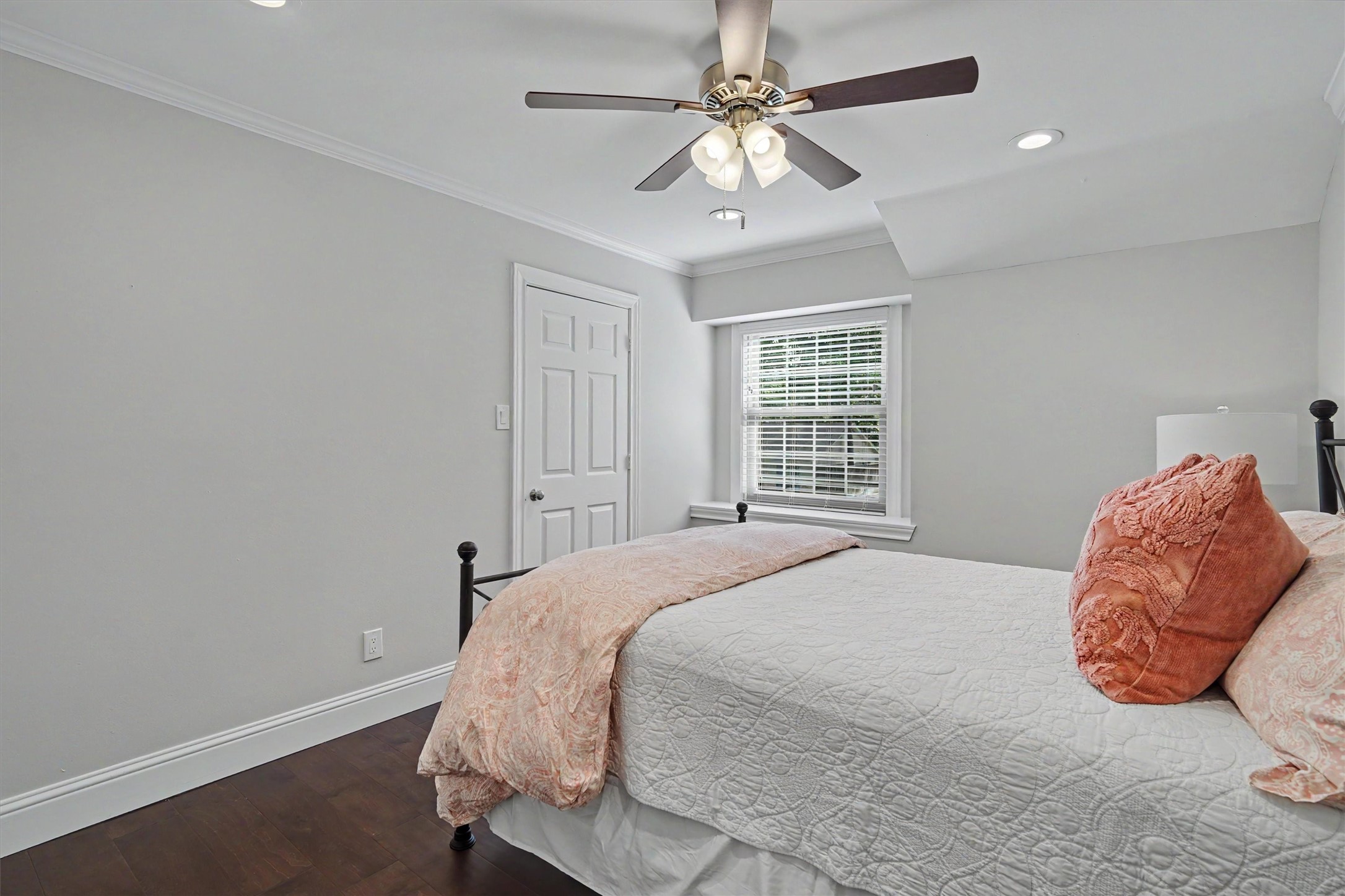 751 Bison Drive Houston, TX 77079 - Photo 25 of 45 a bedroom with a large bed and a window