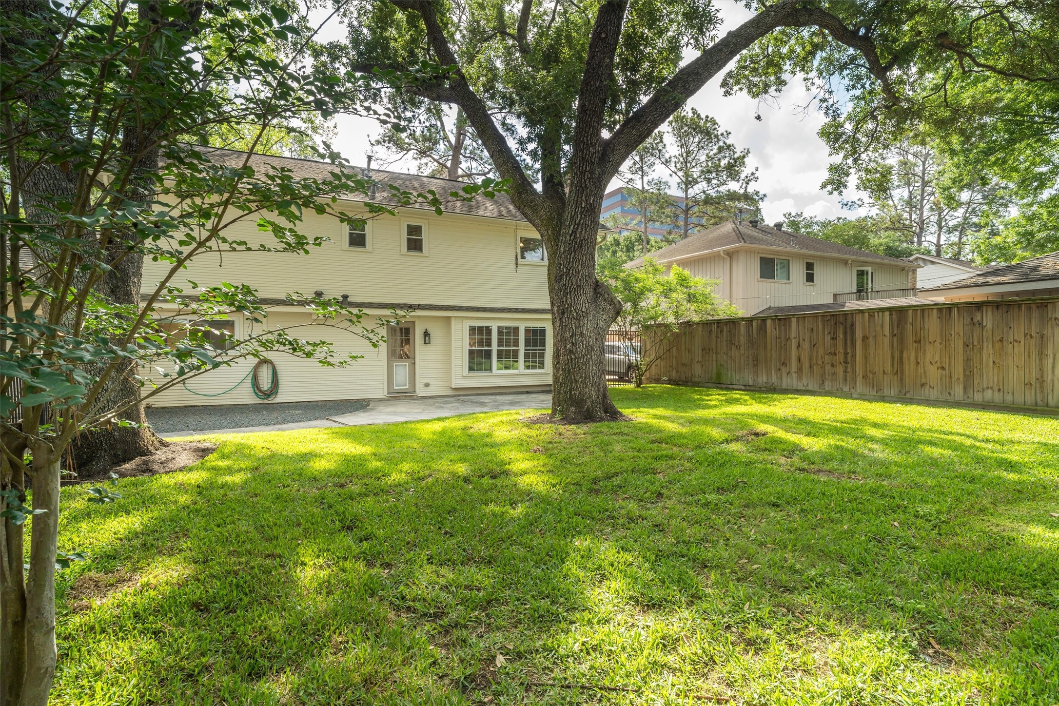 751 Bison Drive Houston, TX 77079 - Photo 30 of 45 a front view of a house with a yard