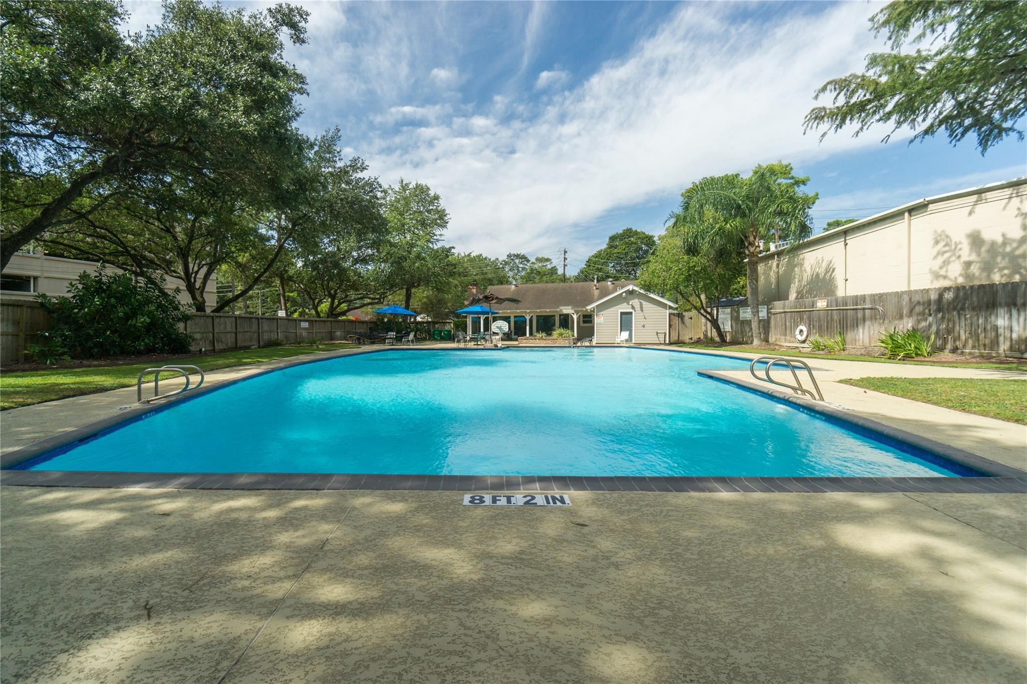 751 Bison Drive Houston, TX 77079 - Photo 37 of 45 a view of yard with swimming pool and green space