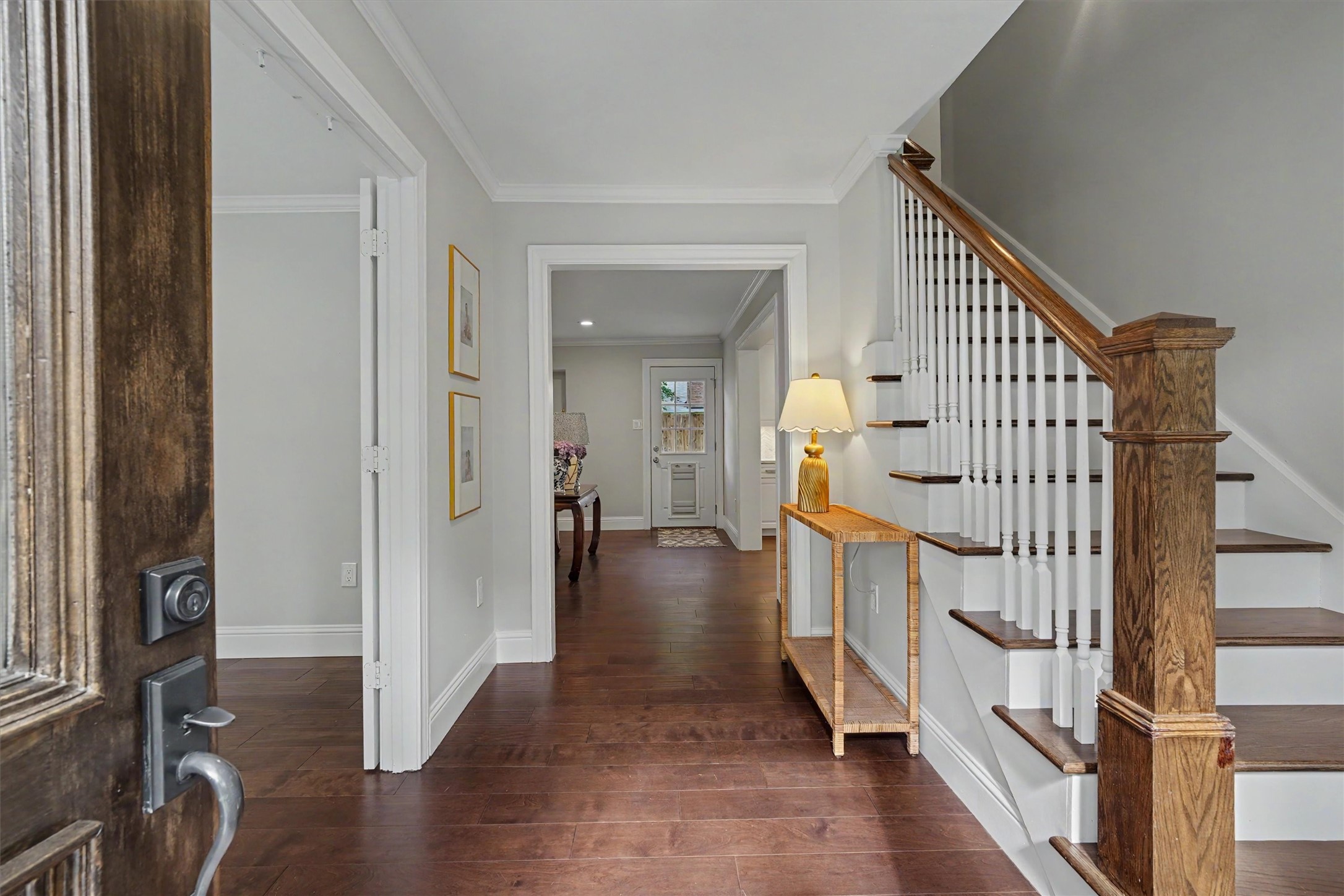 751 Bison Drive Houston, TX 77079 - Photo 5 of 45 a view of entryway with wooden floor and stairs
