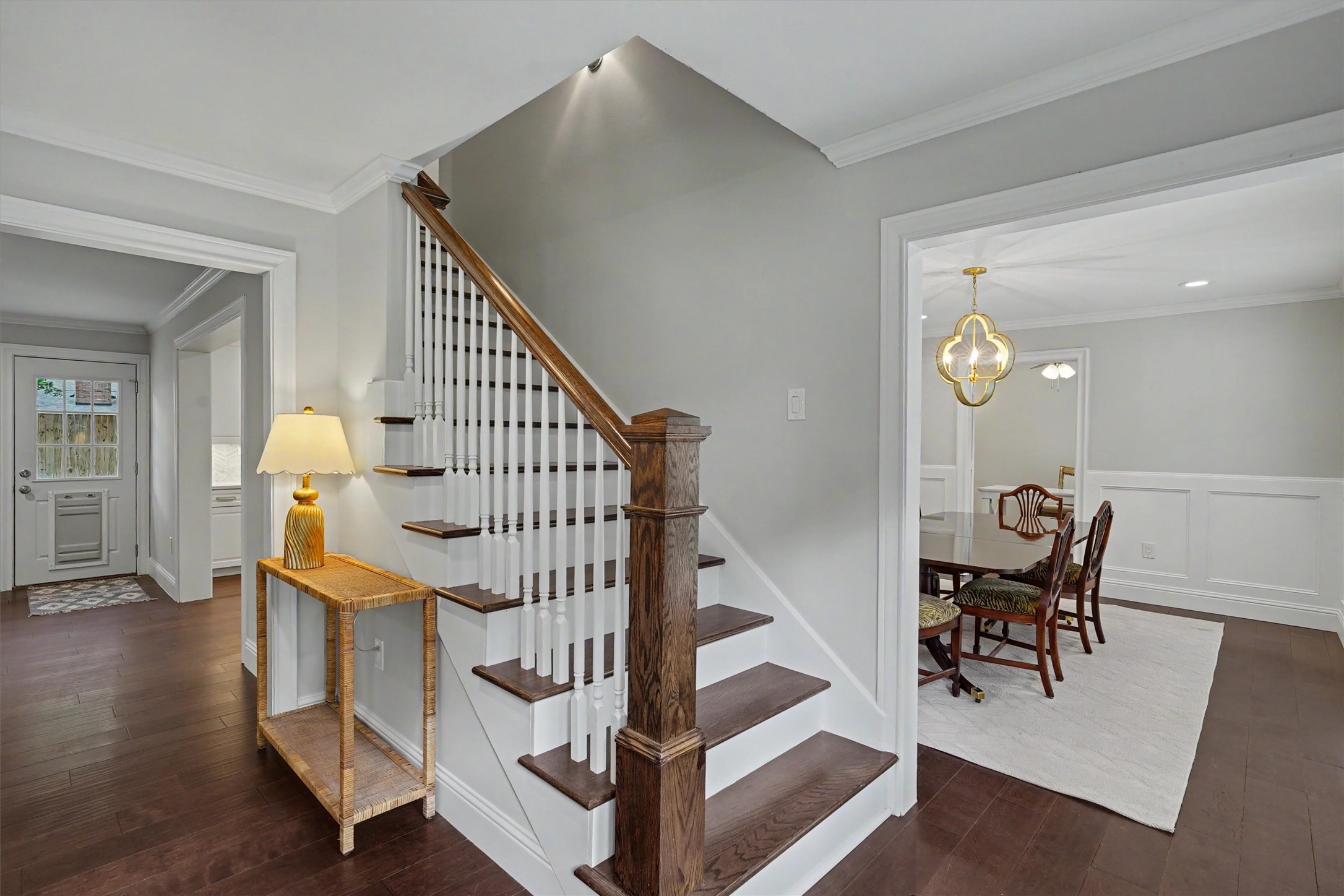 751 Bison Drive Houston, TX 77079 - Photo 6 of 45 a view of entryway dining room and hall with wooden floor