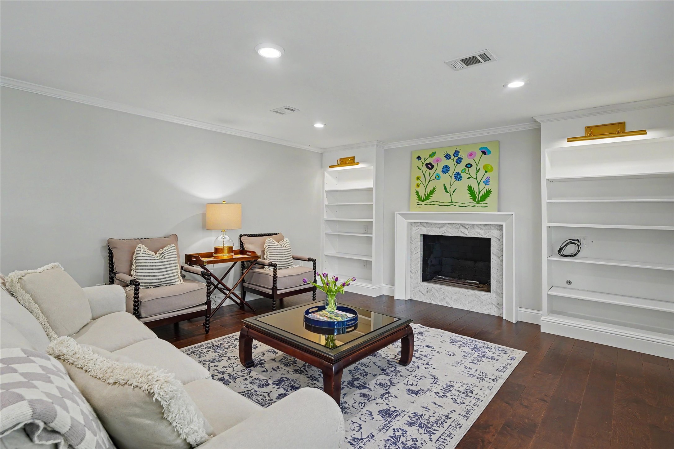 751 Bison Drive Houston, TX 77079 - Photo 10 of 45 a living room with furniture and a fireplace