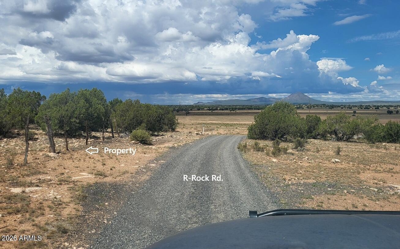 Lot 385 & Arizona Road, Unit 385 Ash Fork, AZ 86320 - Photo 7 of 10 a view of a lake with a yard