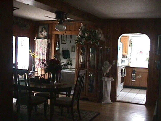 1920 Main St Road Spring Grove, IL 60081 - Photo 5 of 5 a view of a dining room with furniture and chandelier