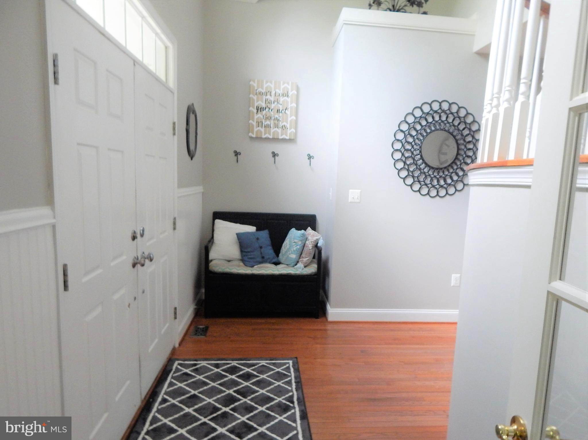 31263 Point Lookout Road Mechanicsville, MD 20659 - Photo 12 of 43 Front entrance Foyer hardwood