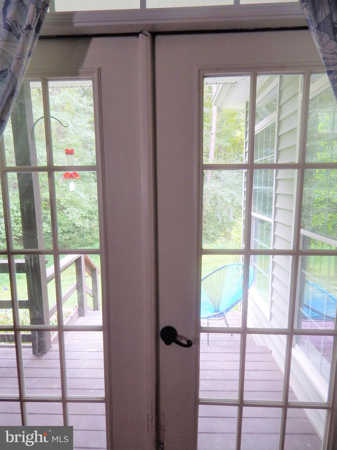 31263 Point Lookout Road Mechanicsville, MD 20659 - Photo 23 of 43 French doors off master bedroom to deck