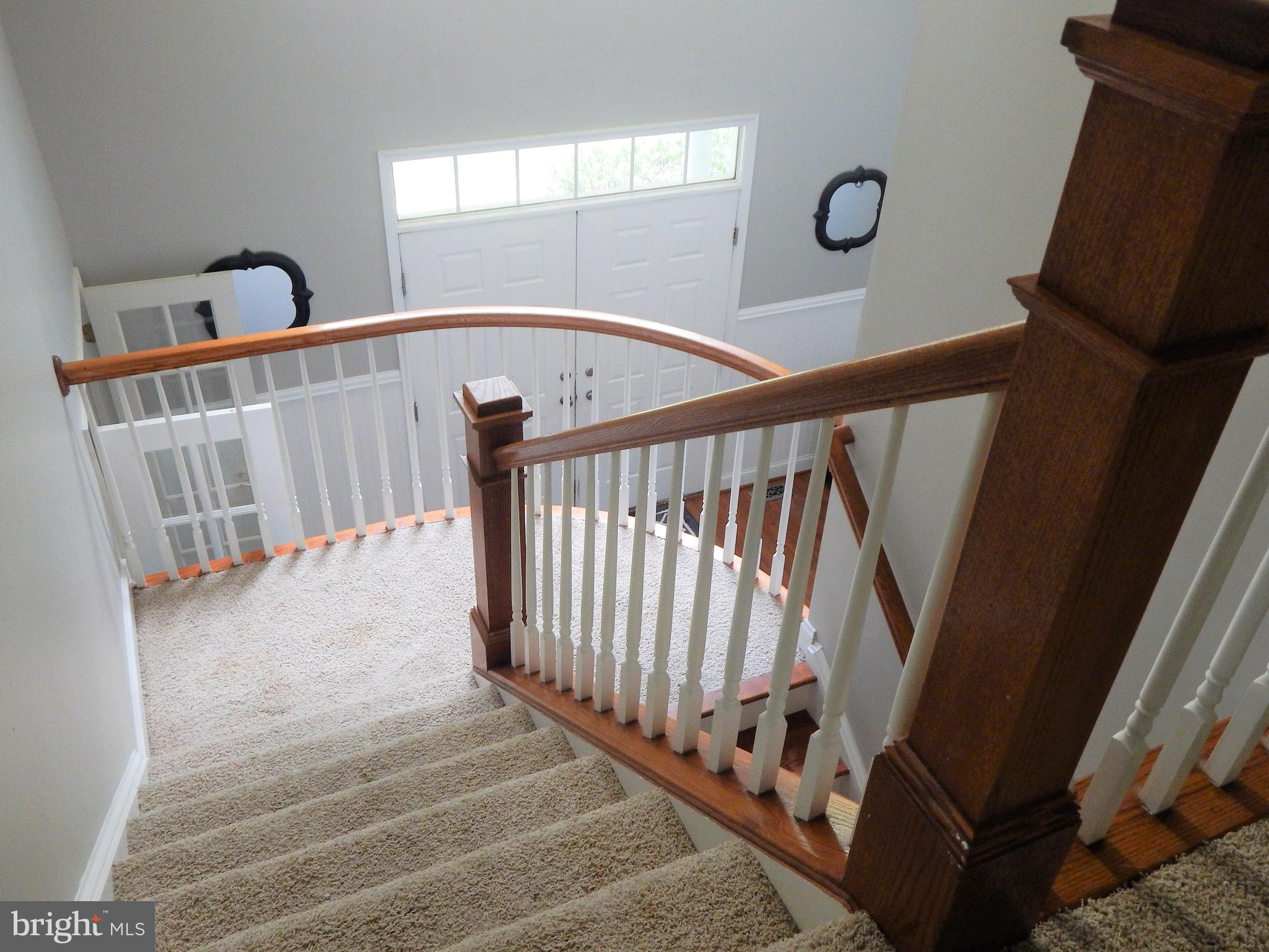 31263 Point Lookout Road Mechanicsville, MD 20659 - Photo 36 of 43 Curved staricase