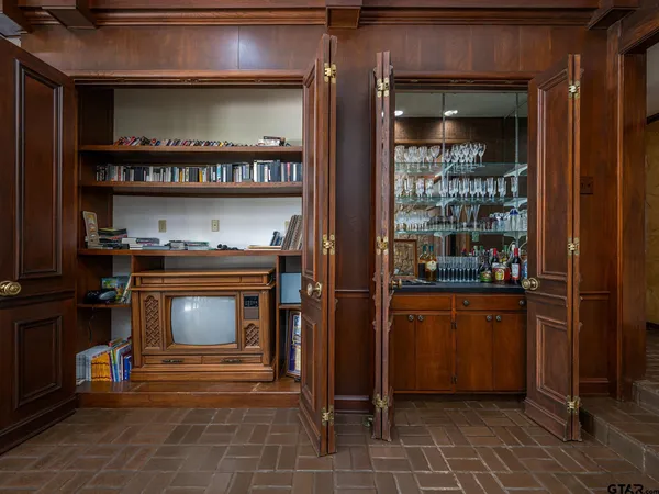 a kitchen with stainless steel appliances granite countertop a stove and a refrigerator