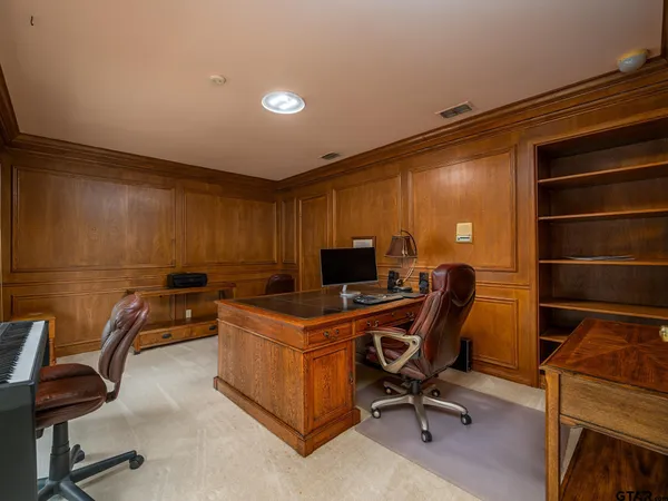 a view of a workspace with furniture