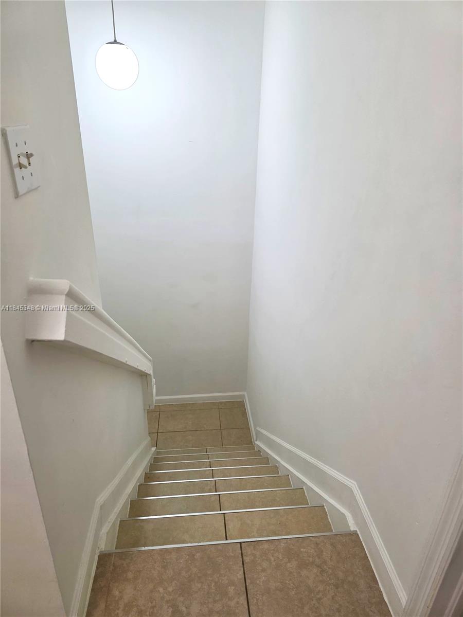 11357 Southwest 230th Terrace Miami, FL 33170 - Photo 11 of 24 a view of an empty room