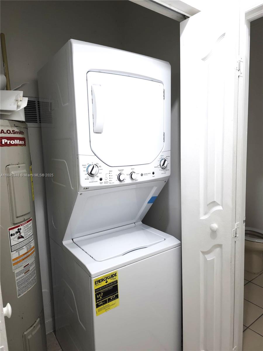 11357 Southwest 230th Terrace Miami, FL 33170 - Photo 9 of 24 a utility room with dryer and washer