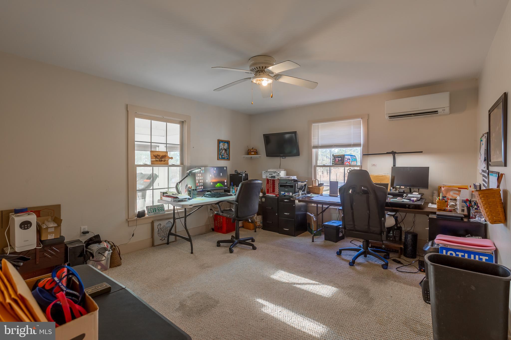 3819 Maple Dam Road Cambridge, MD 21613 - Photo 26 of 79 a view of a workspace with furniture and a window