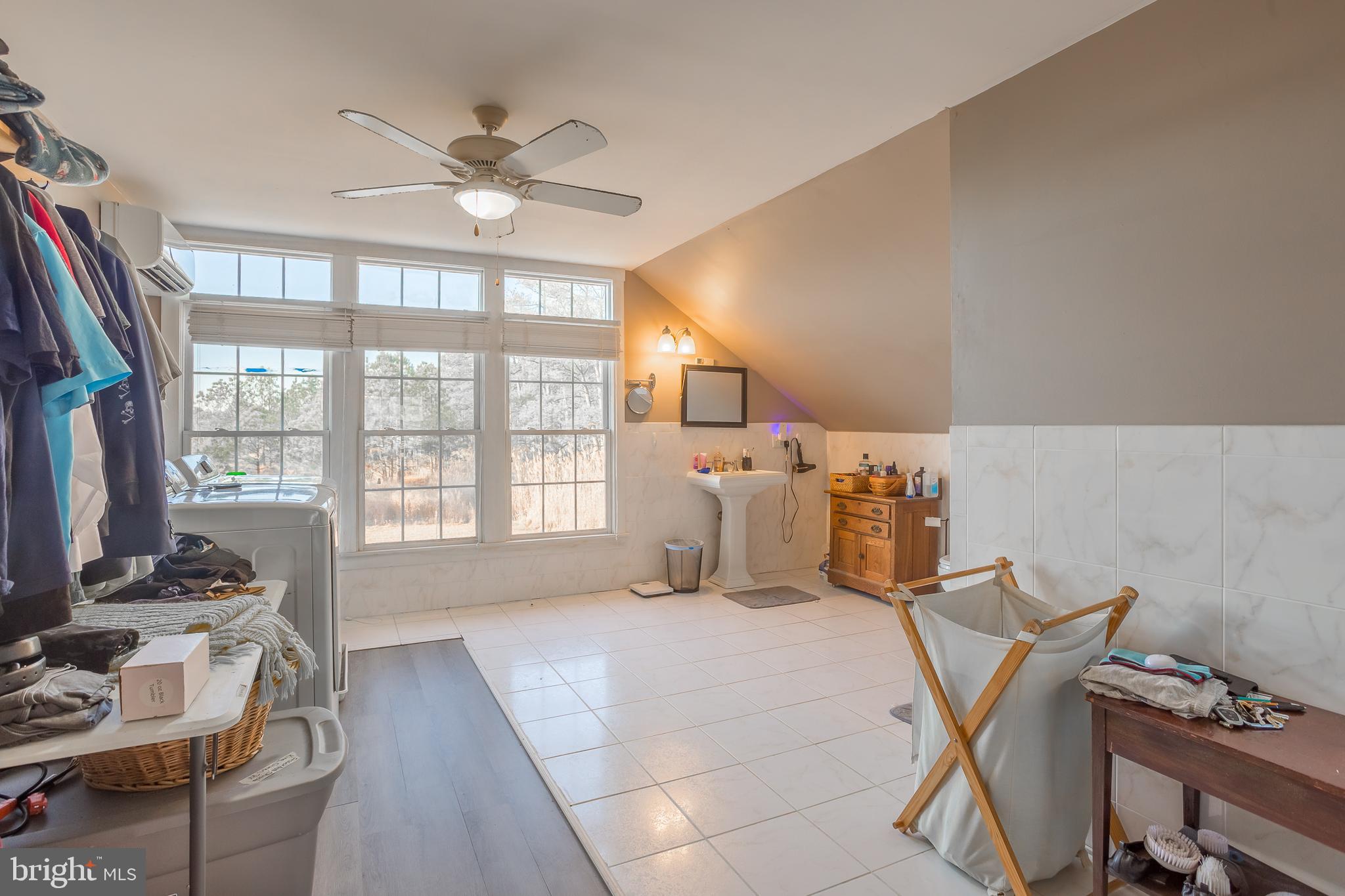 3819 Maple Dam Road Cambridge, MD 21613 - Photo 33 of 79 a bedroom with furniture and a window