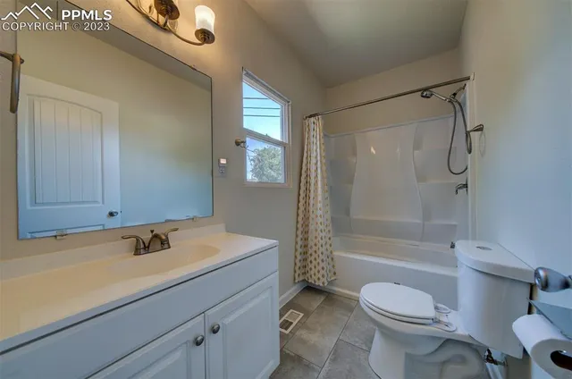 a view of a hallway with washer and dryer