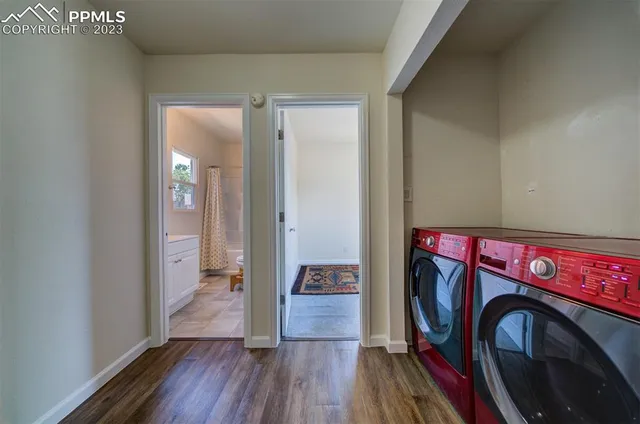 an outdoor space with patio furniture and potted plants