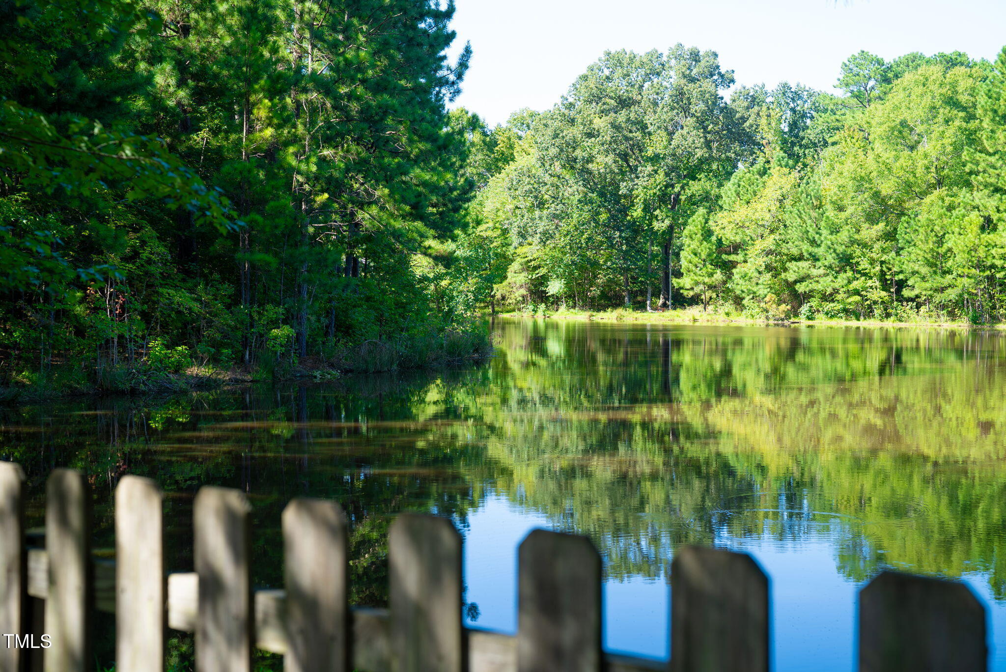 311 Coachmans Trail Stem, NC 27581 - Photo 26 of 27 a view of a lake from a yard