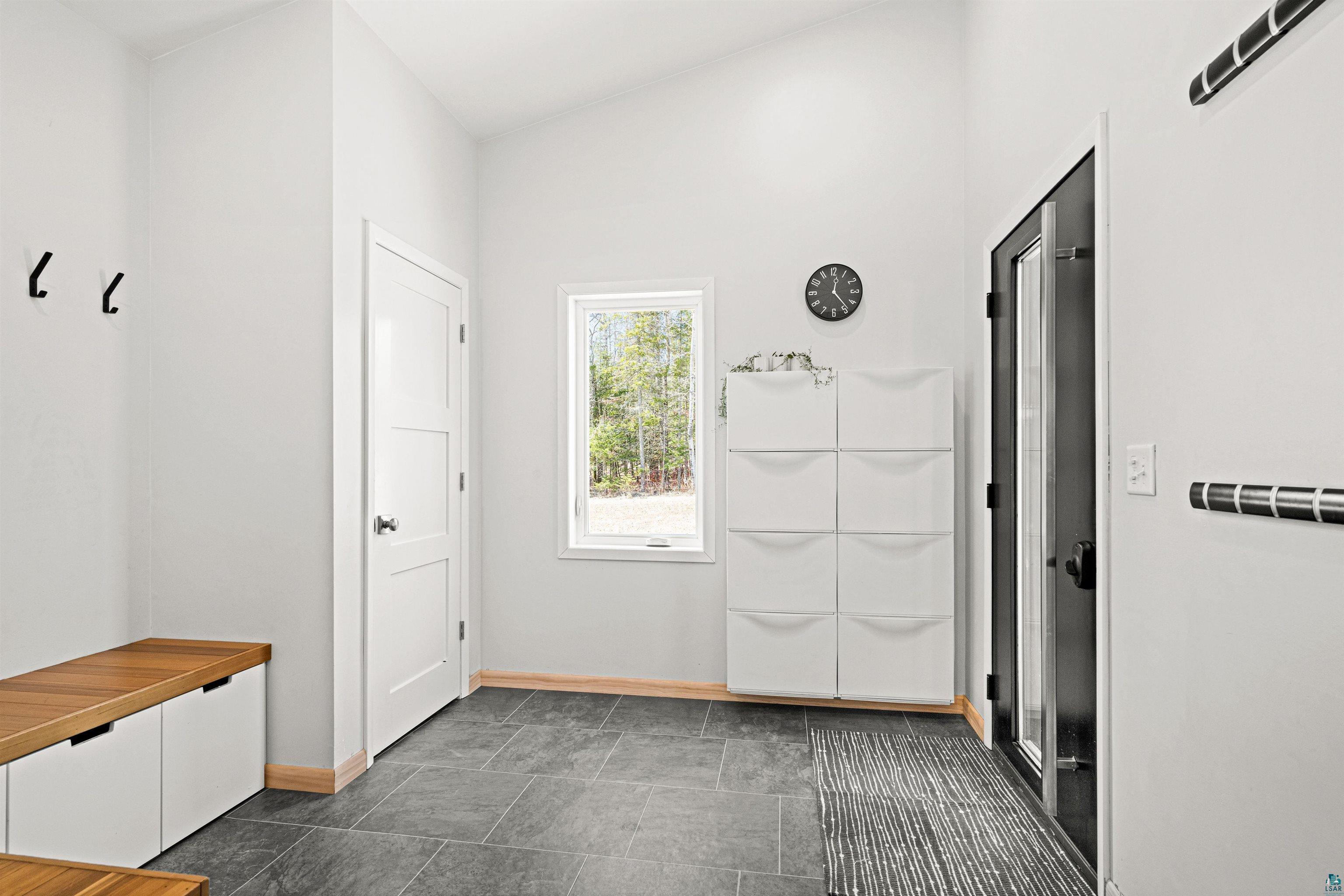 5638 Bergquist Road Duluth, MN 55804 - Photo 21 of 43 Mudroom with baseboards