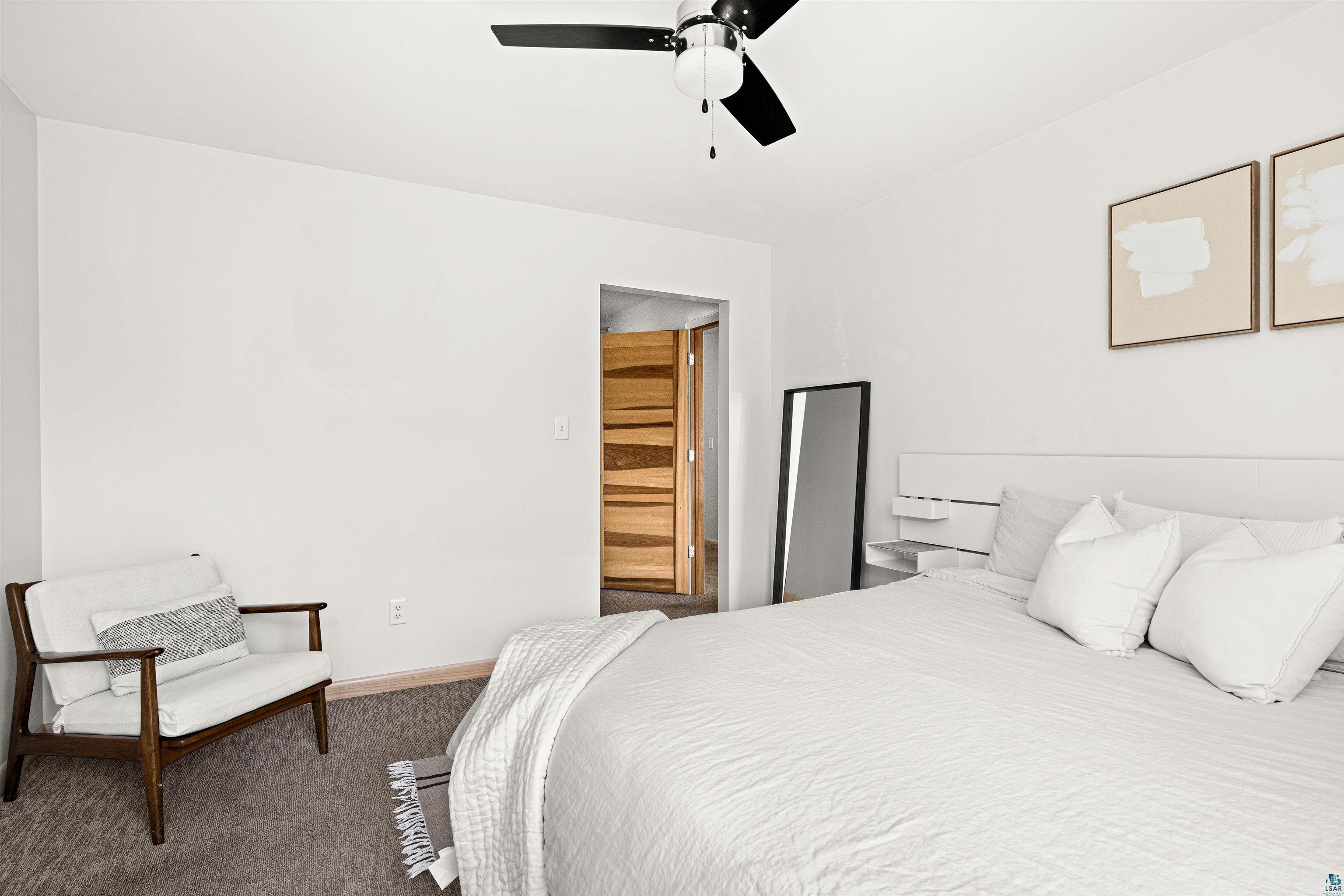 5638 Bergquist Road Duluth, MN 55804 - Photo 26 of 43 Master Bedroom with ceiling fan and carpeted floor
