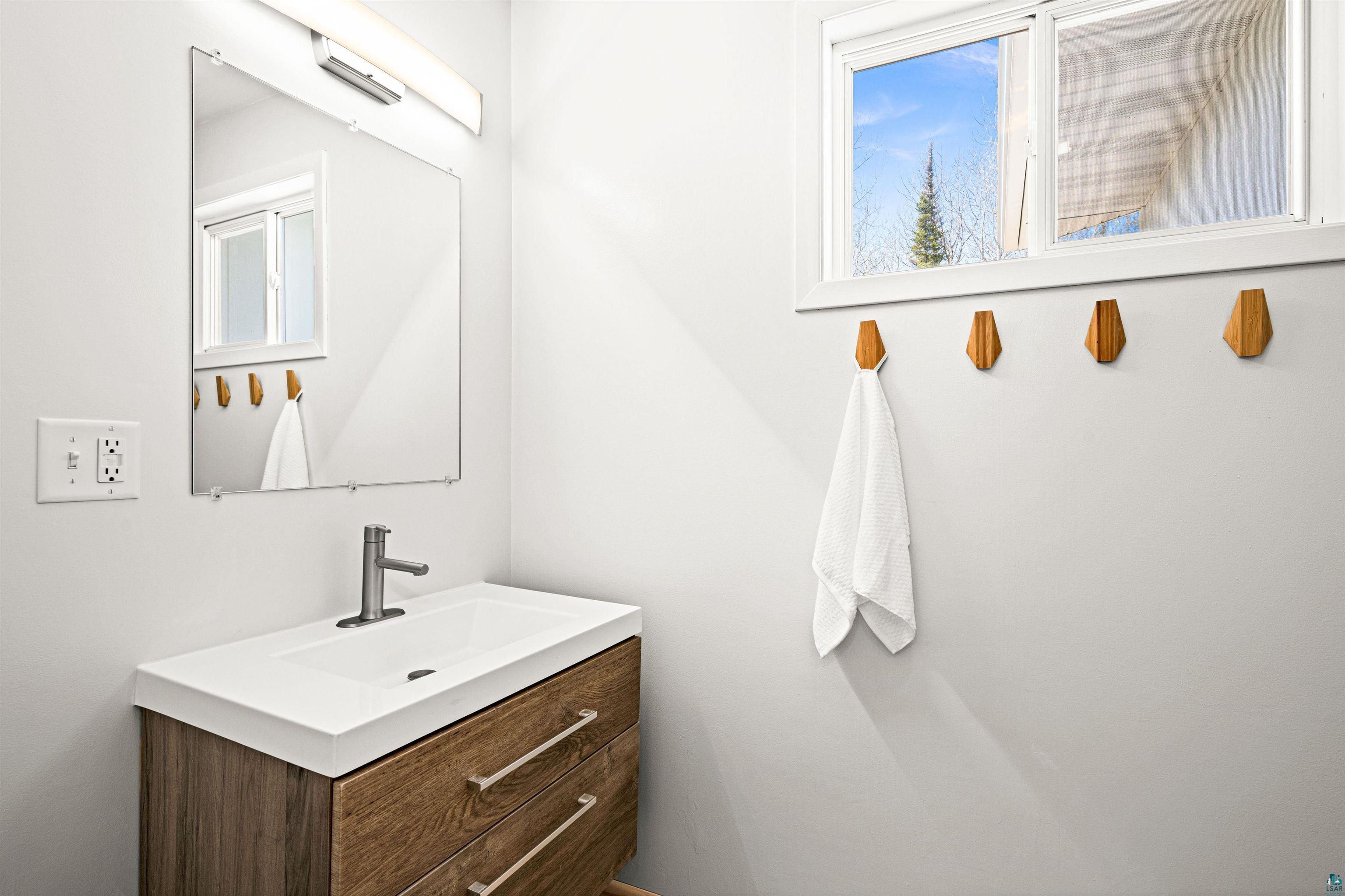 5638 Bergquist Road Duluth, MN 55804 - Photo 27 of 43 Bathroom with vanity