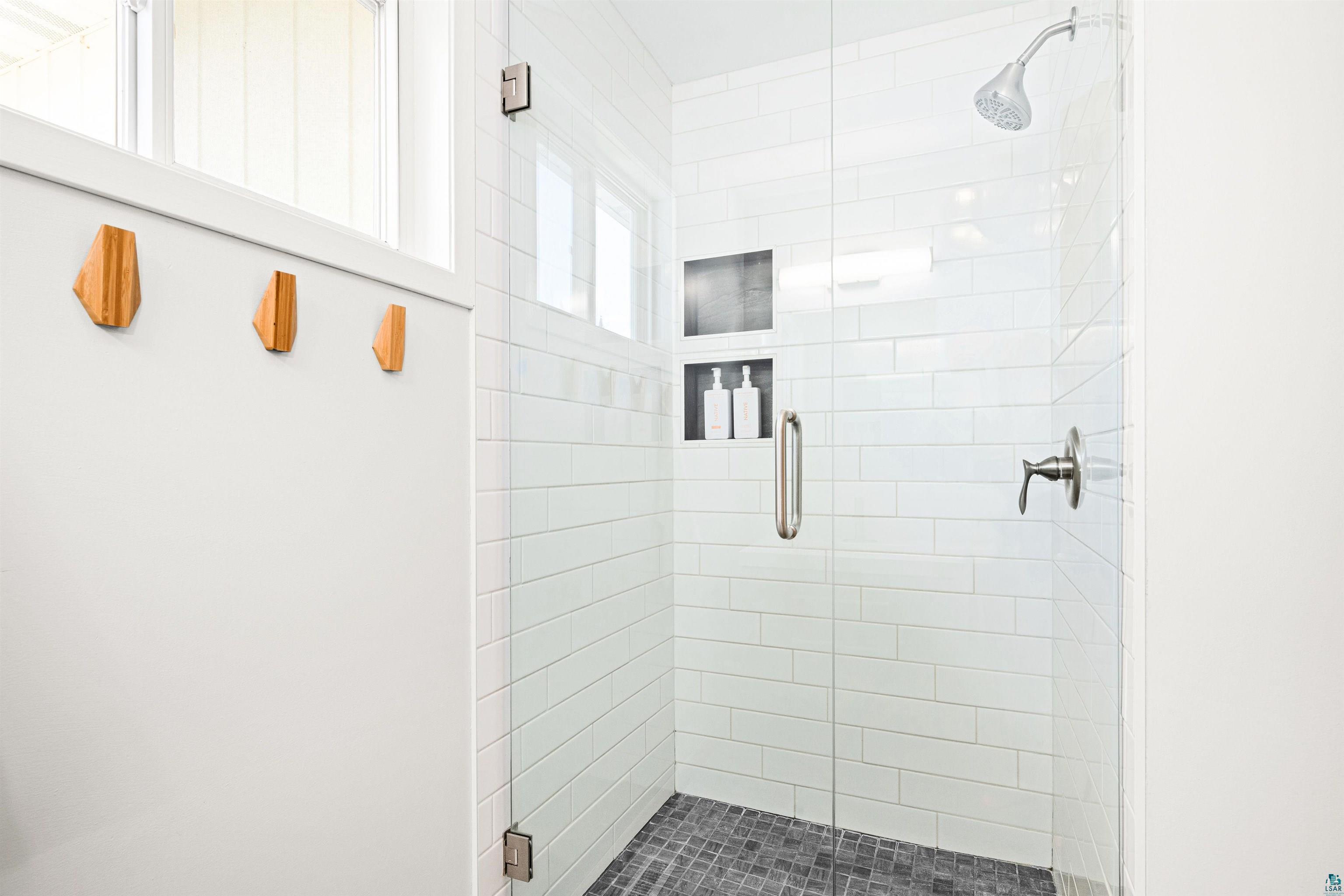 5638 Bergquist Road Duluth, MN 55804 - Photo 28 of 43 Master Bath featuring walk-in tiled shower
