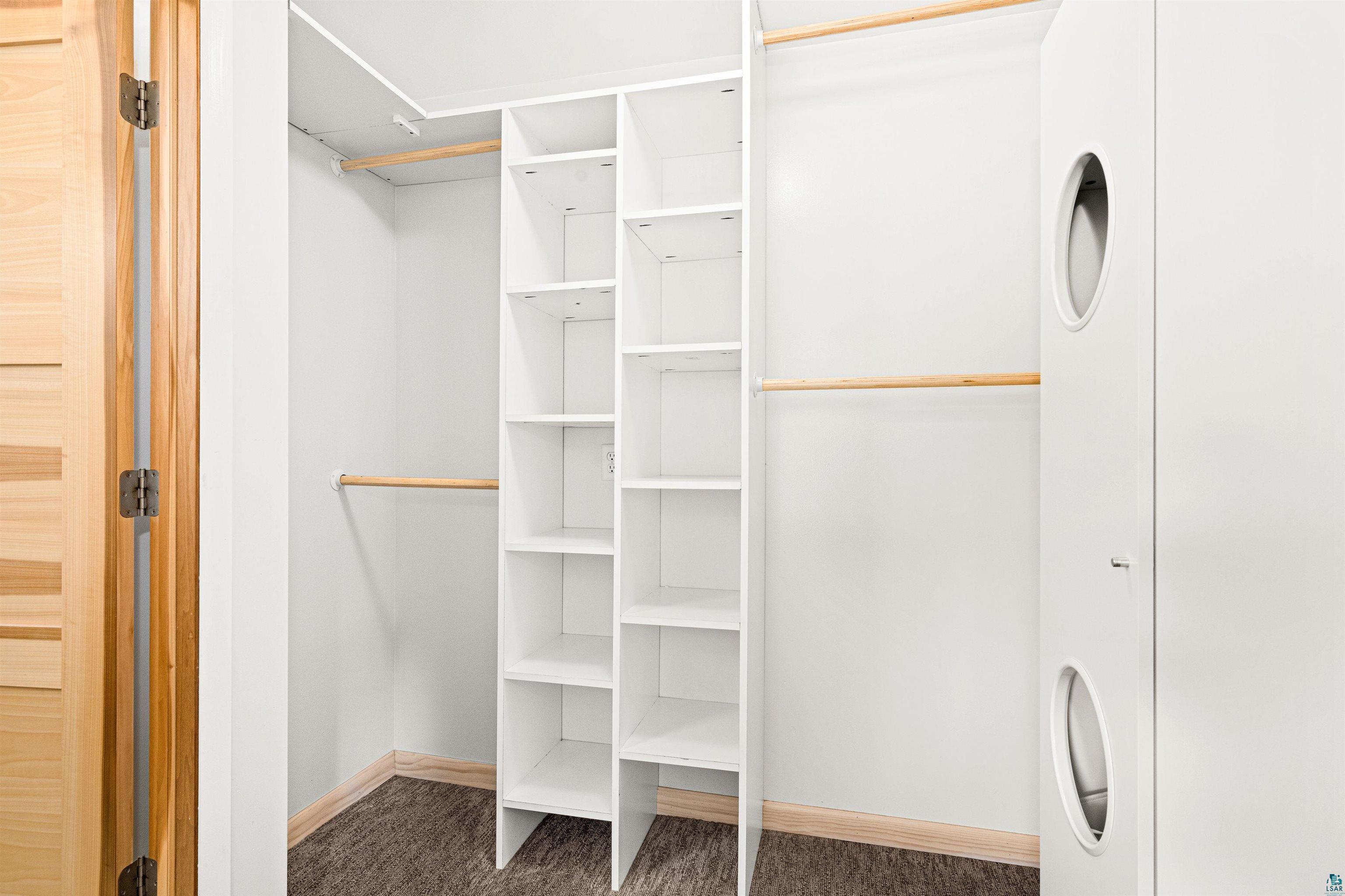 5638 Bergquist Road Duluth, MN 55804 - Photo 29 of 43 Walk in closet with carpet flooring