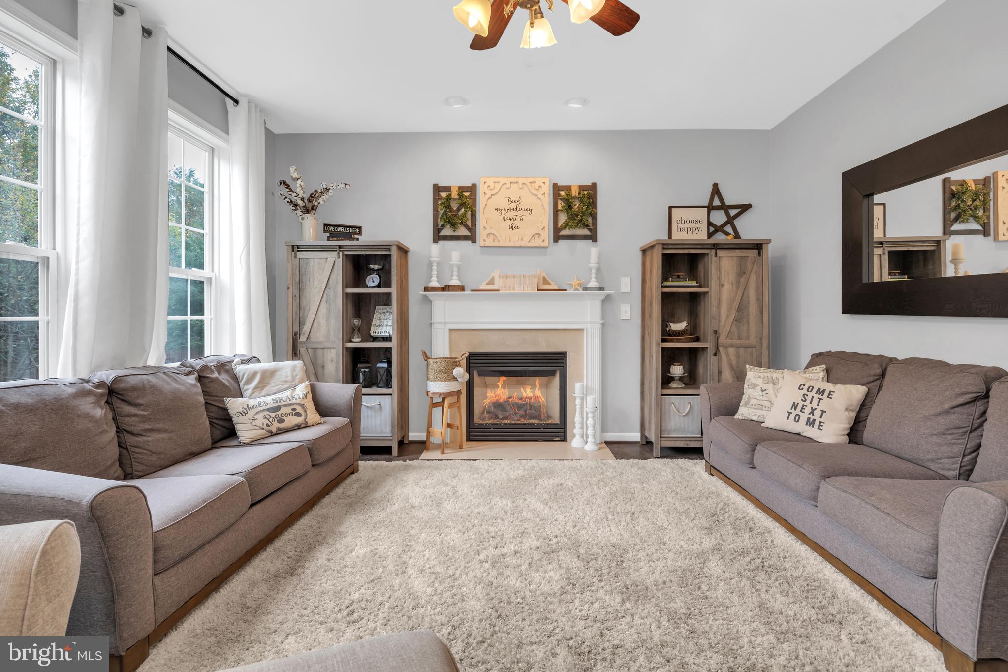 7581 Rio Grande Way Gainesville, VA 20155 - Photo 15 of 52 Get cozy and stay awhile in the family room.