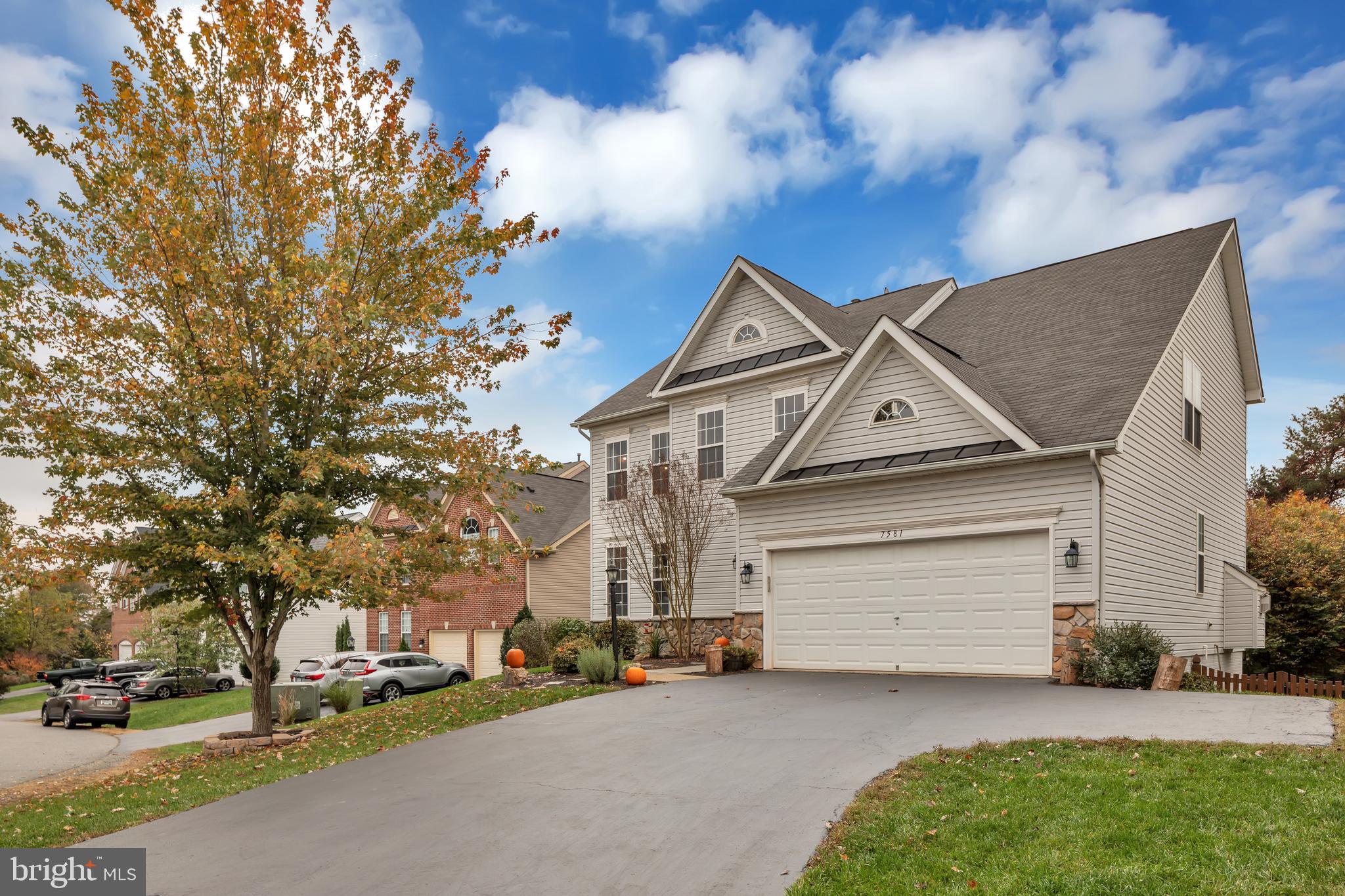 7581 Rio Grande Way Gainesville, VA 20155 - Photo 41 of 52 The large driveway easily fits 6 cars!