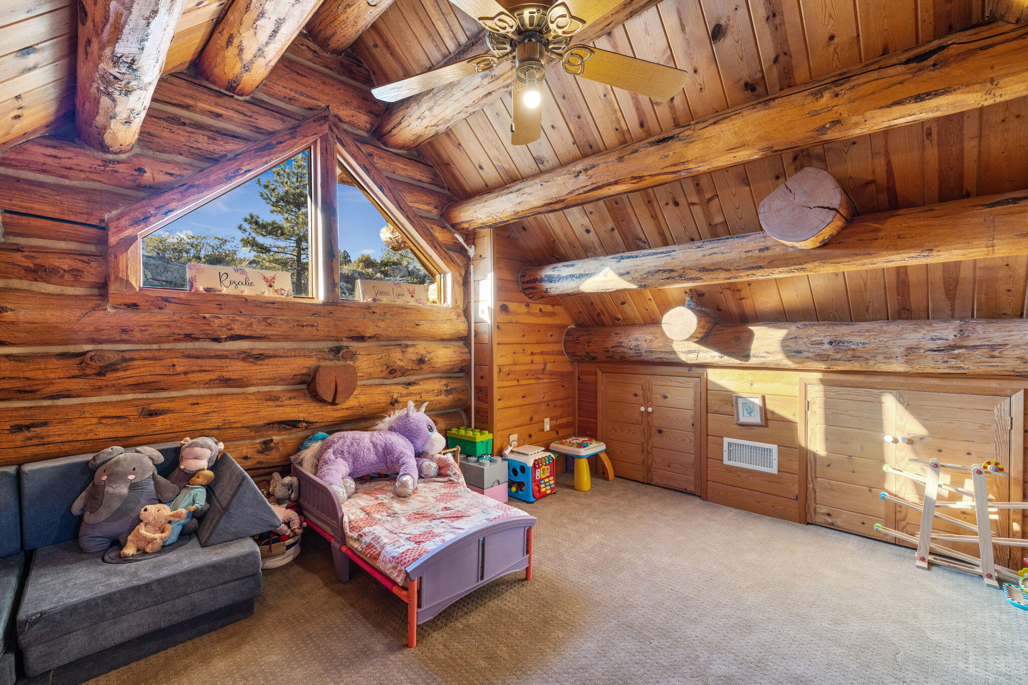 60766 Table Mountain Road Mountain Center, CA 92561 - Photo 26 of 46 a living room with furniture and a ceiling fan