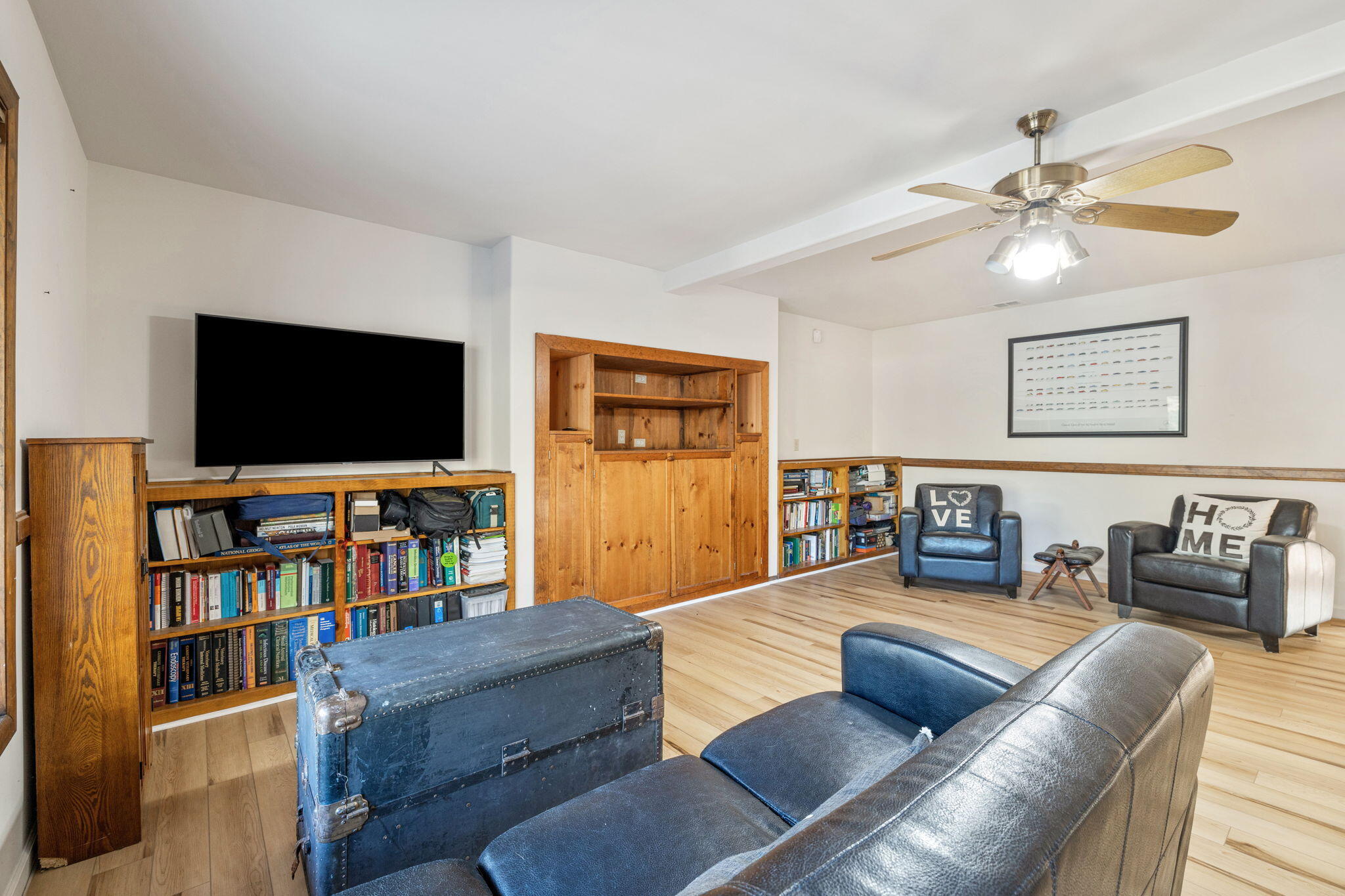 60766 Table Mountain Road Mountain Center, CA 92561 - Photo 29 of 46 a living room with furniture and a flat screen tv