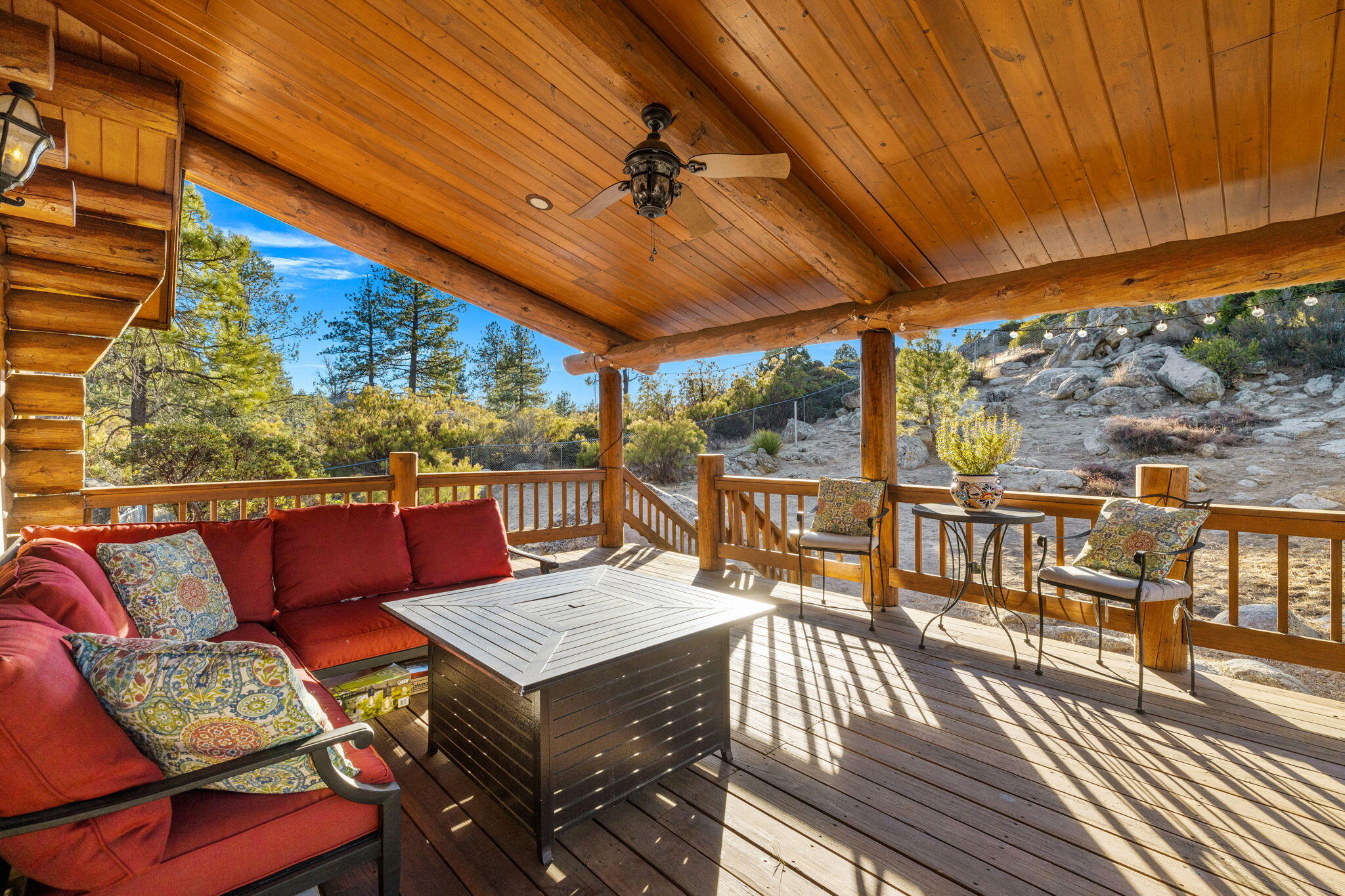60766 Table Mountain Road Mountain Center, CA 92561 - Photo 37 of 46 a view of a balcony with furniture and wooden floor